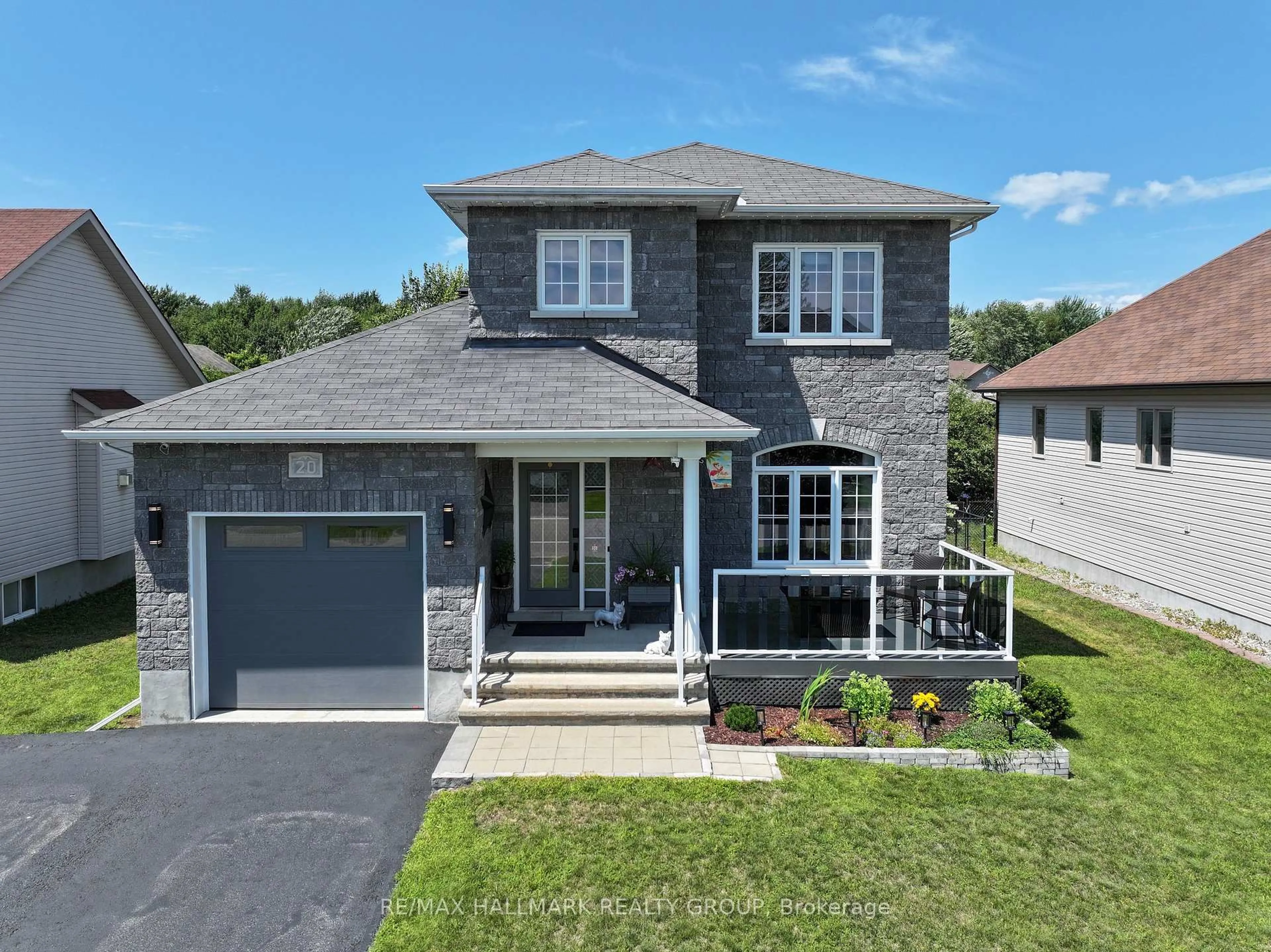 Home with brick exterior material, street for 20 Dune St, Russell Ontario K0A 2M0