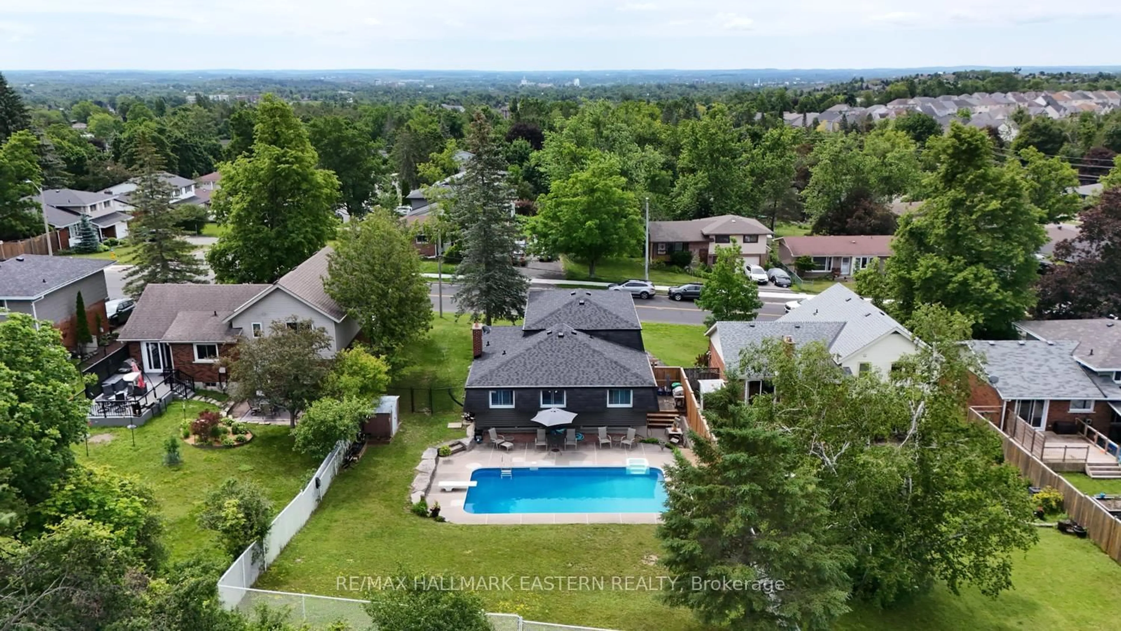 A pic from outside/outdoor area/front of a property/back of a property/a pic from drone, water/lake/river/ocean view for 1000 Cumberland Ave, Peterborough Ontario K9H 7B2