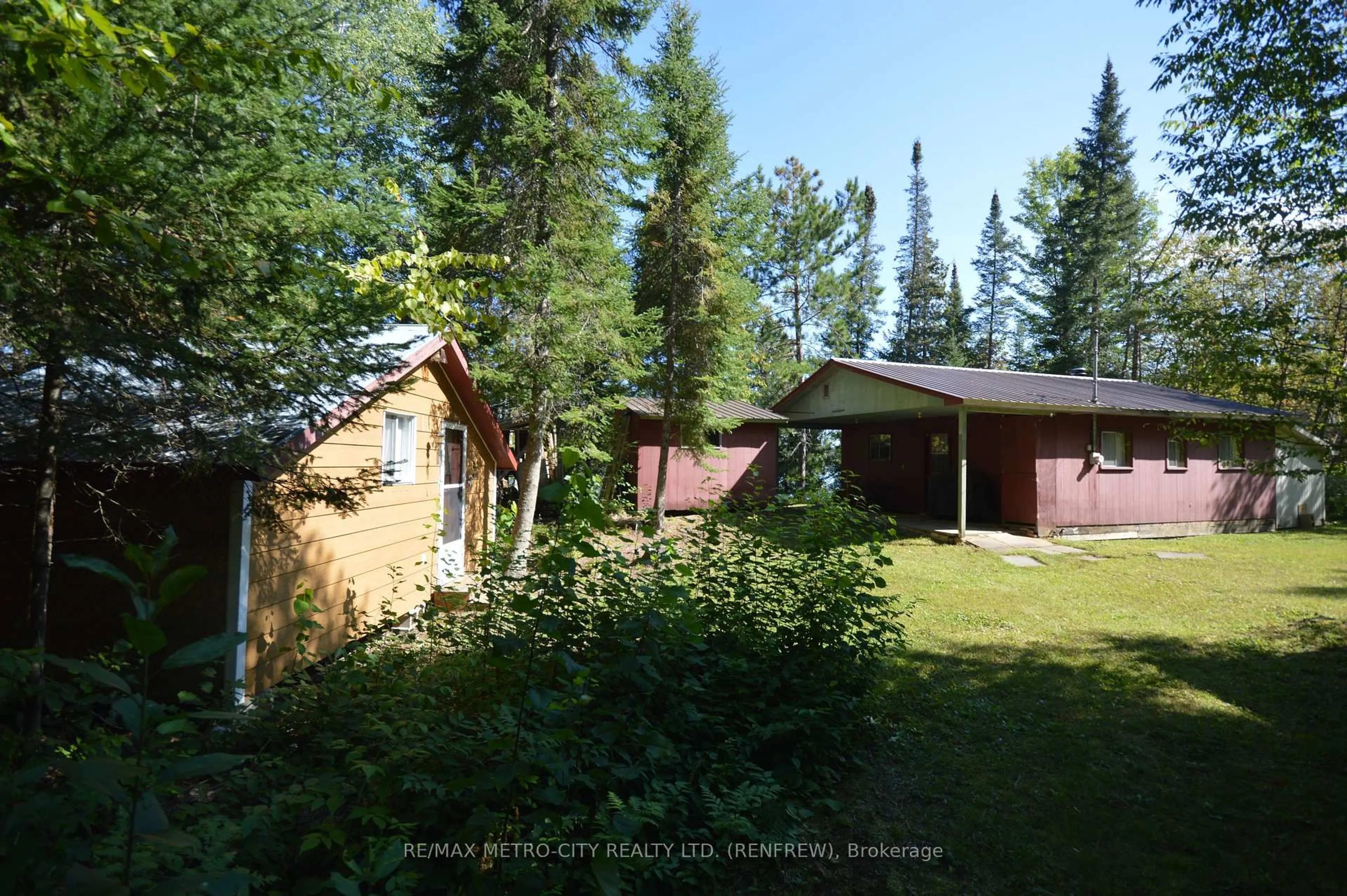 A pic from outside/outdoor area/front of a property/back of a property/a pic from drone, forest/trees view for 482 Cameron Lake Rd, Palmer Rapids Ontario K0J 2E0