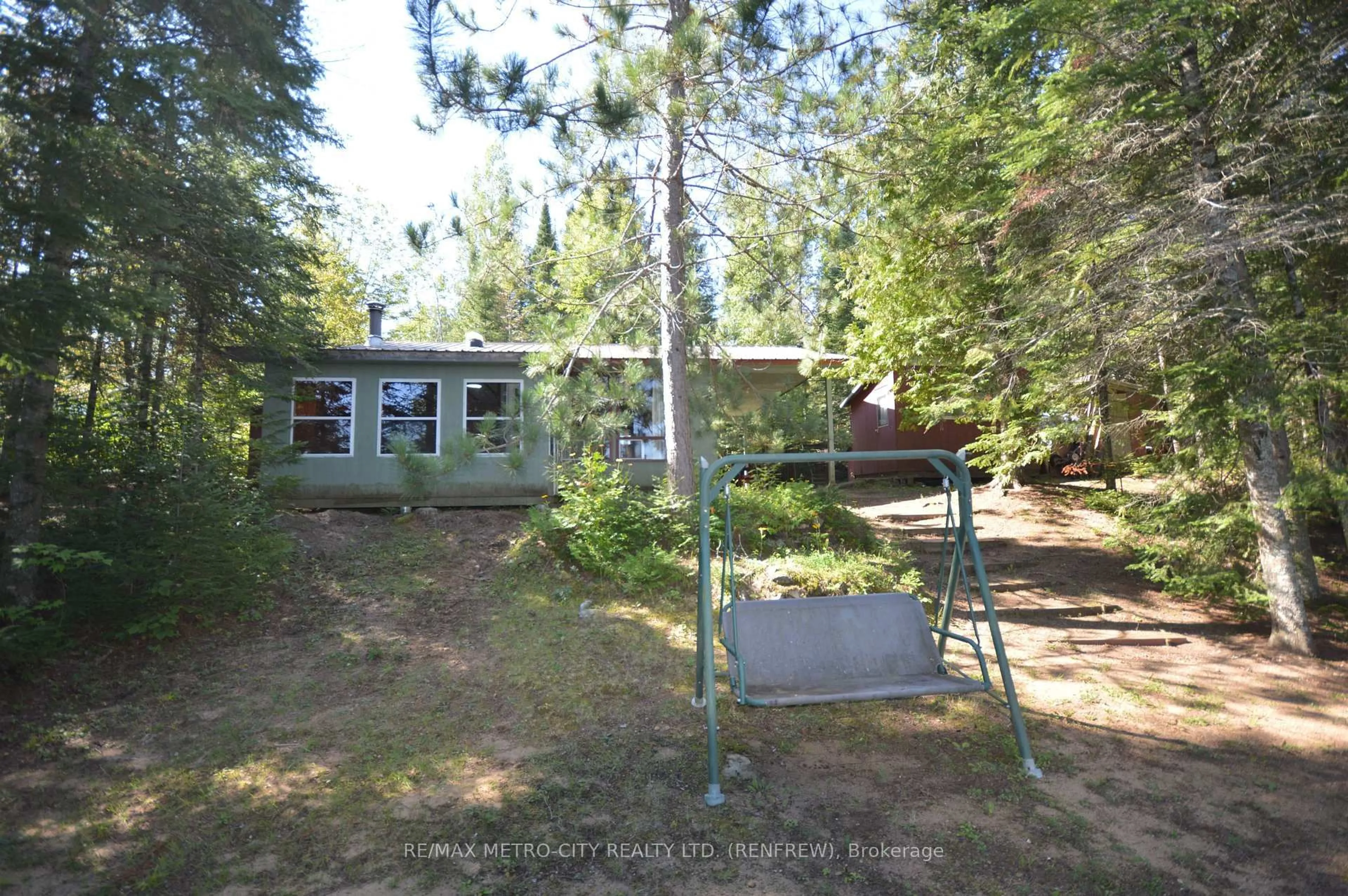 A pic from outside/outdoor area/front of a property/back of a property/a pic from drone, forest/trees view for 482 Cameron Lake Rd, Palmer Rapids Ontario K0J 2E0