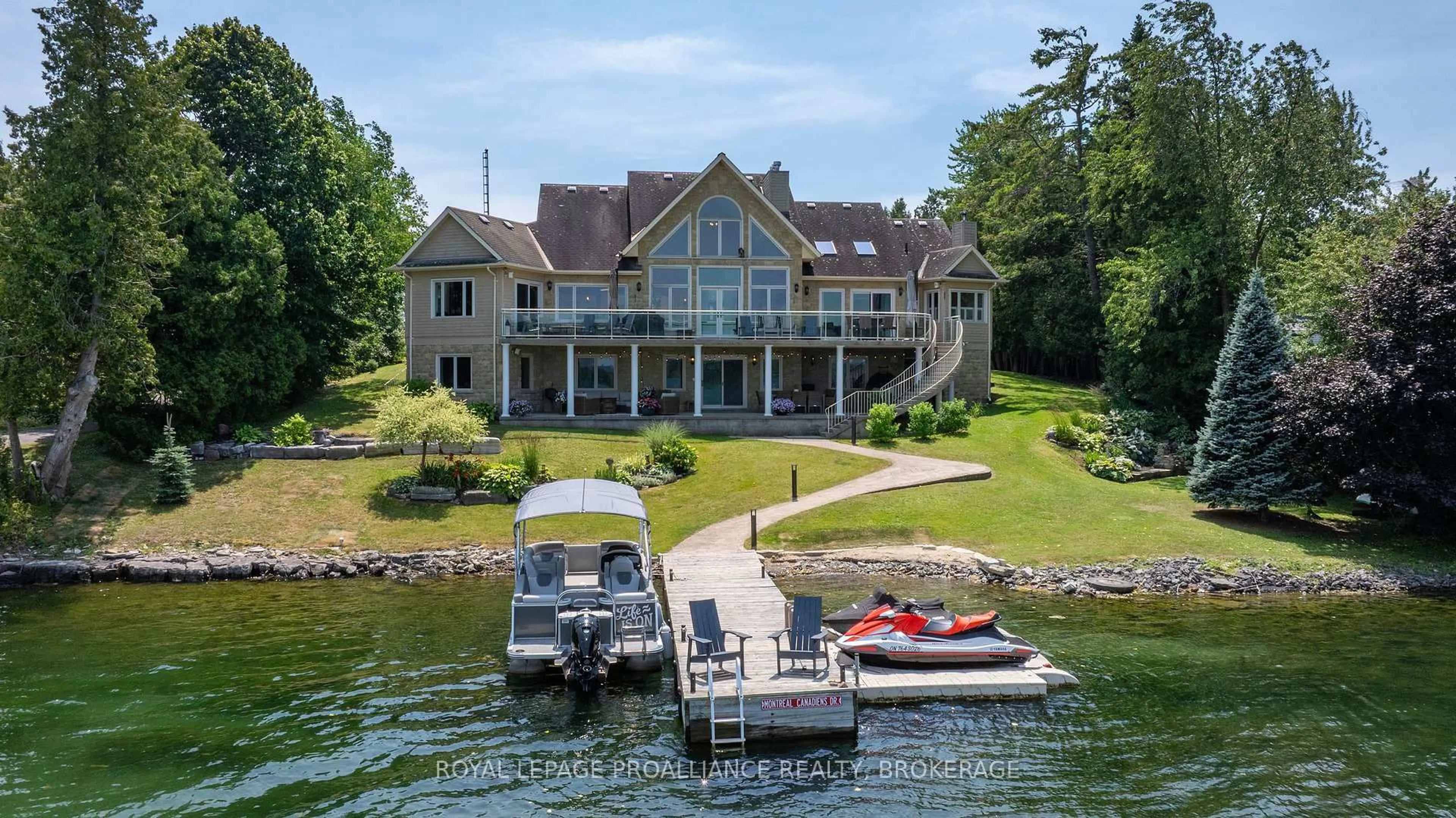 A pic from outside/outdoor area/front of a property/back of a property/a pic from drone, water/lake/river/ocean view for 31 Leavis Shores, Gananoque Ontario K7G 2V6