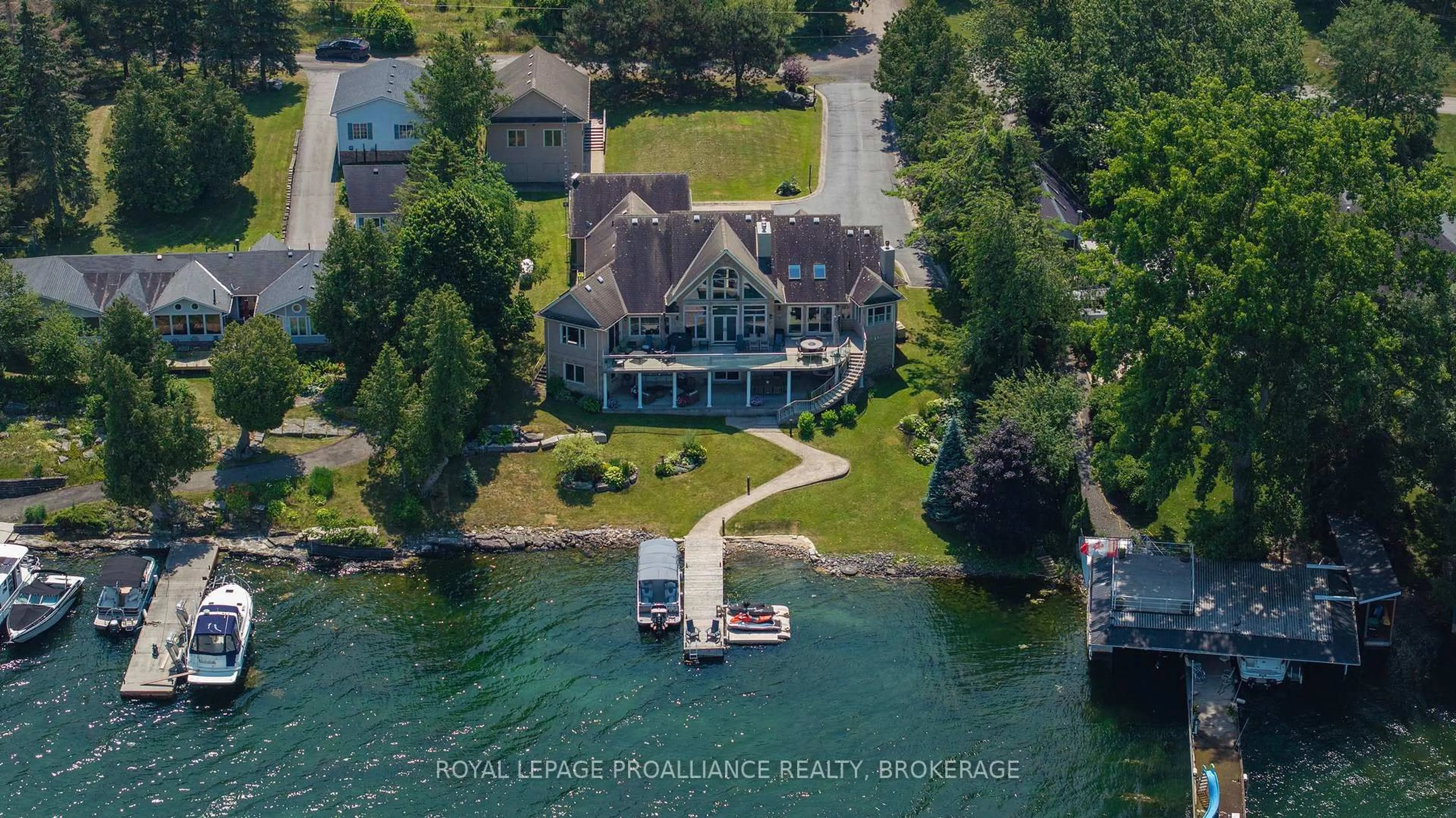 A pic from outside/outdoor area/front of a property/back of a property/a pic from drone, water/lake/river/ocean view for 31 Leavis Shores, Gananoque Ontario K7G 2V6