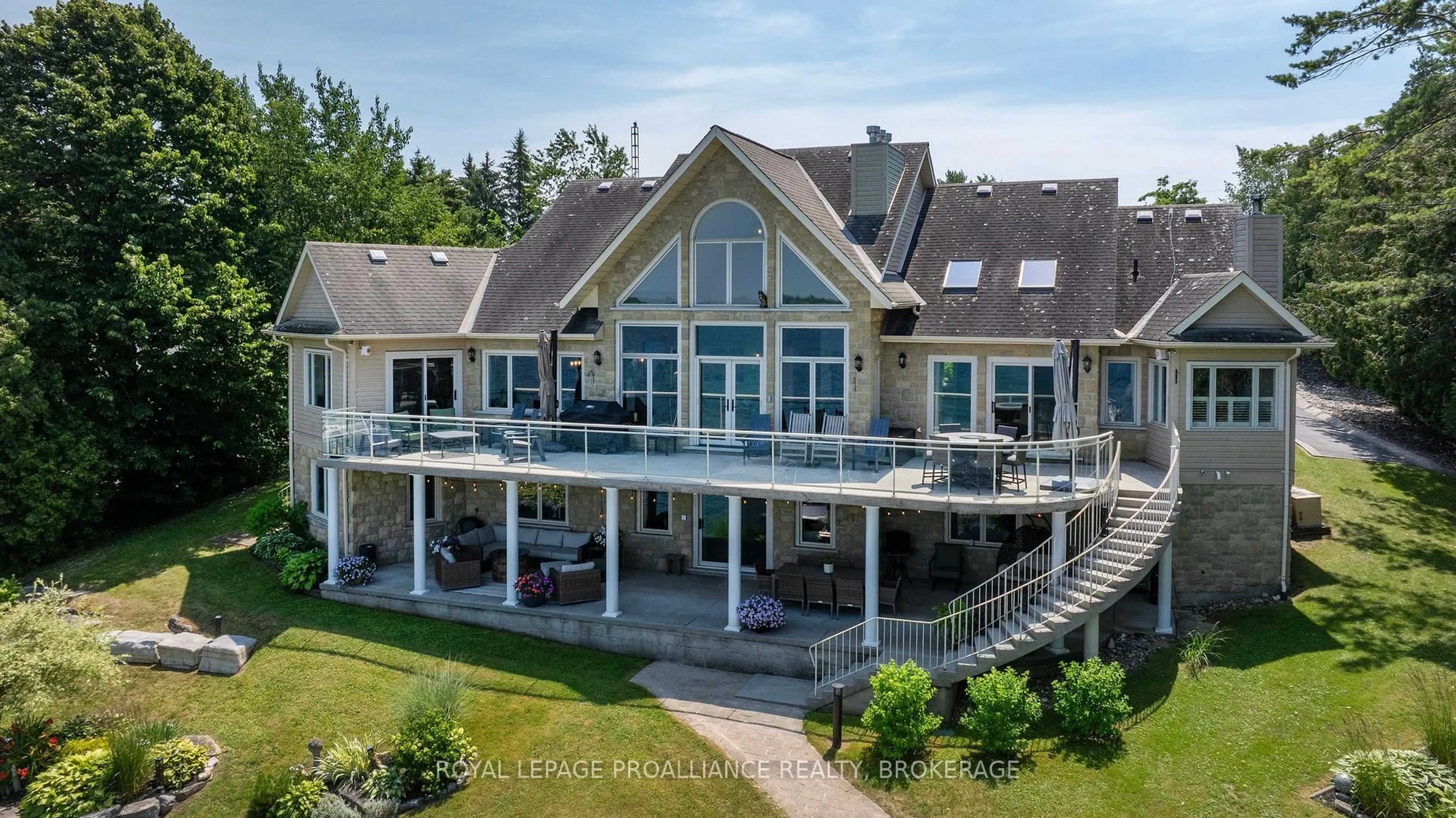 A pic from outside/outdoor area/front of a property/back of a property/a pic from drone, water/lake/river/ocean view for 31 Leavis Shores, Gananoque Ontario K7G 2V6