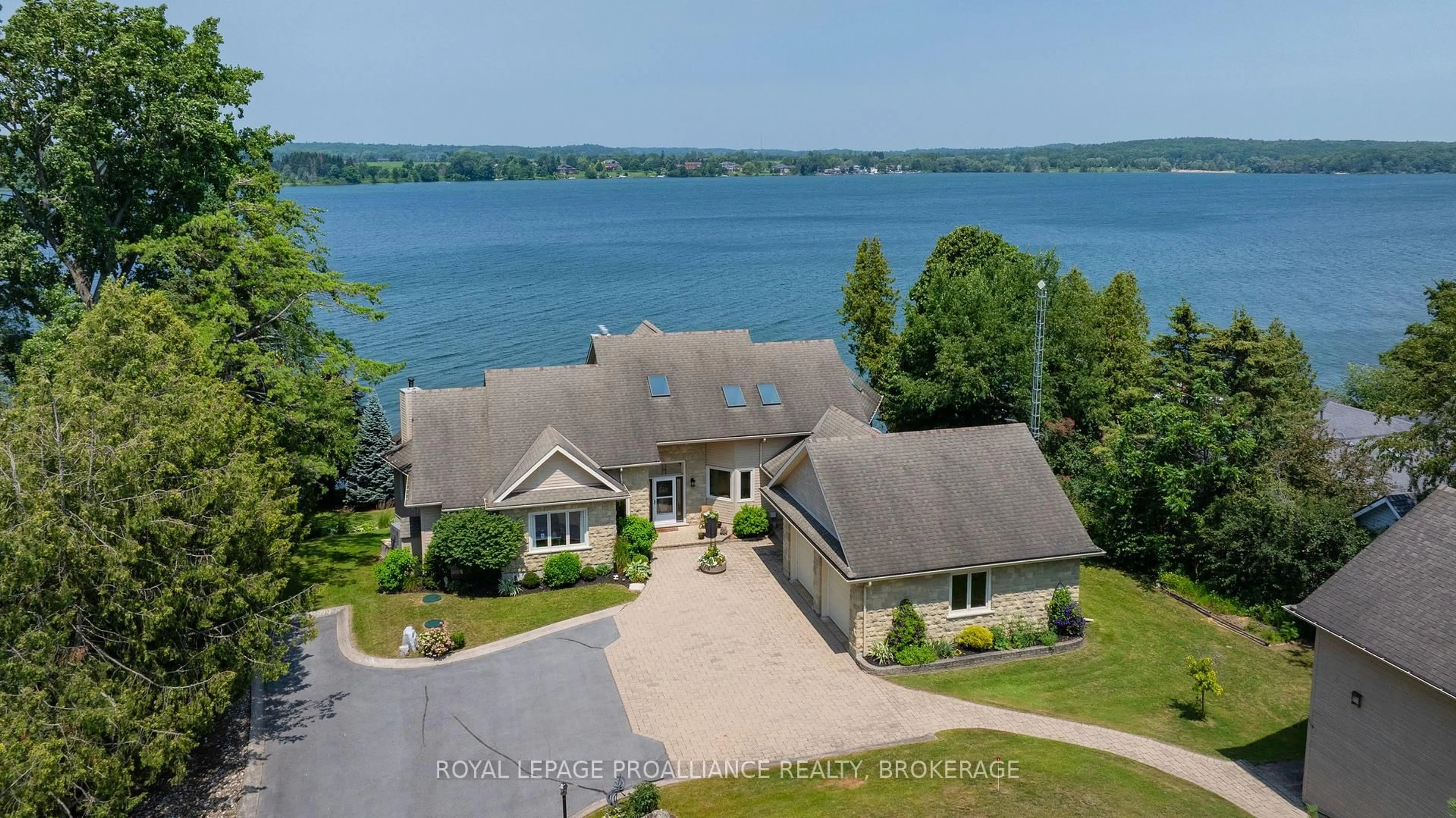 A pic from outside/outdoor area/front of a property/back of a property/a pic from drone, water/lake/river/ocean view for 31 Leavis Shores, Gananoque Ontario K7G 2V6