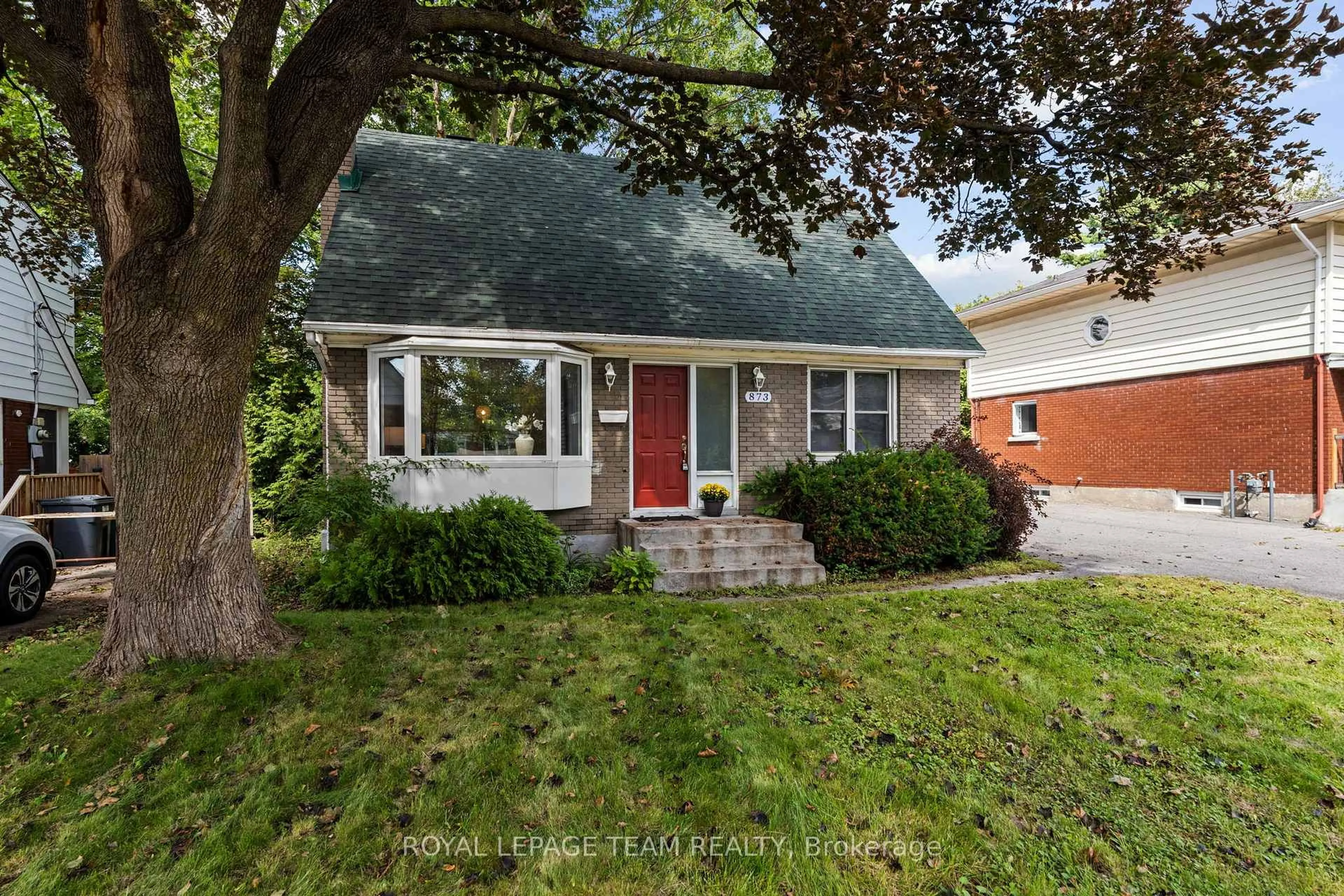 Home with brick exterior material, street for 873 Smyth Rd, Ottawa Ontario K1G 1P4