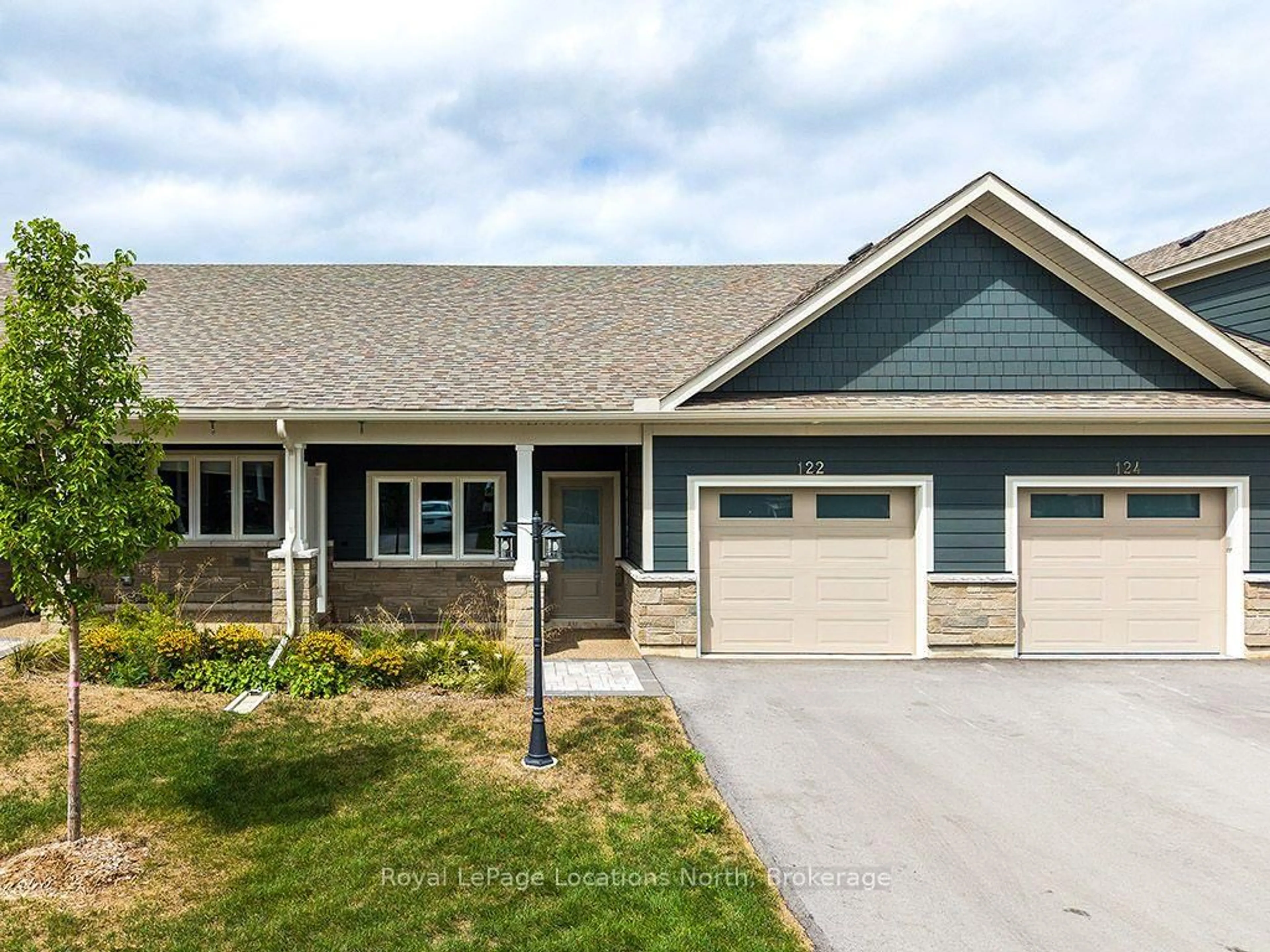 Home with vinyl exterior material, street for 122 Dove Dr, Blue Mountains Ontario N0H 2P0