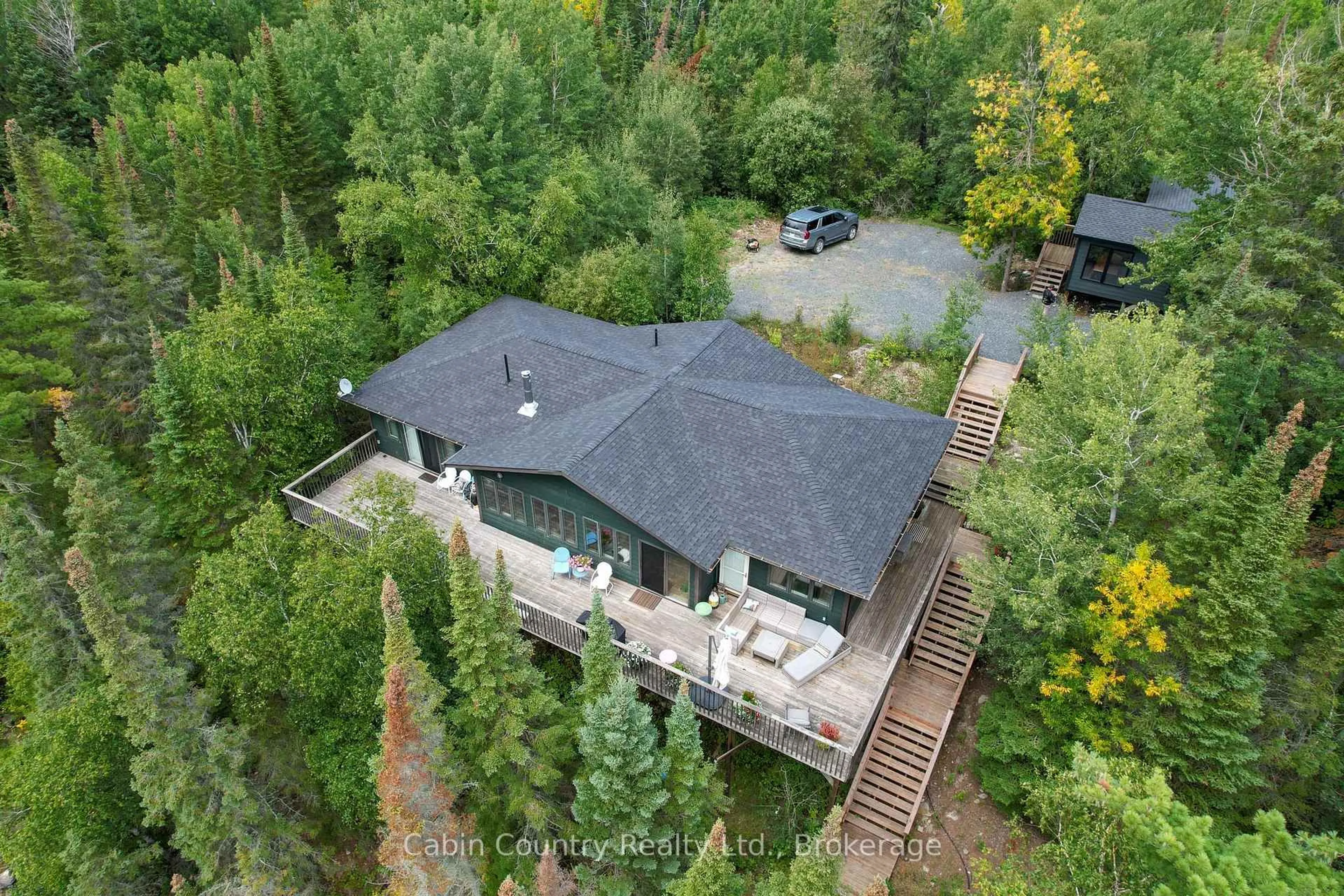 A pic from outside/outdoor area/front of a property/back of a property/a pic from drone, forest/trees view for 1-55 Lily Pad, Kenora Remote Area Ontario P0X 1C0