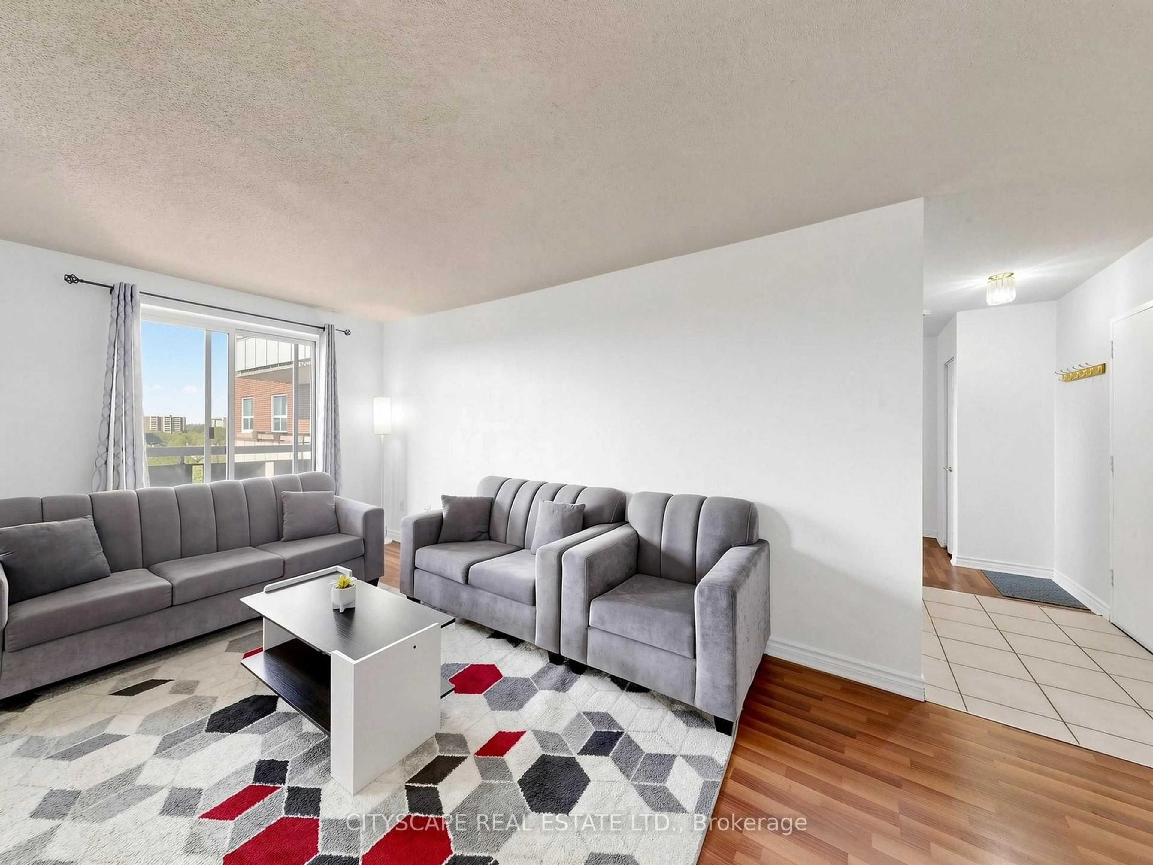 Living room with furniture, unknown for 851 Queenston Rd #708, Hamilton Ontario L8G 1B4