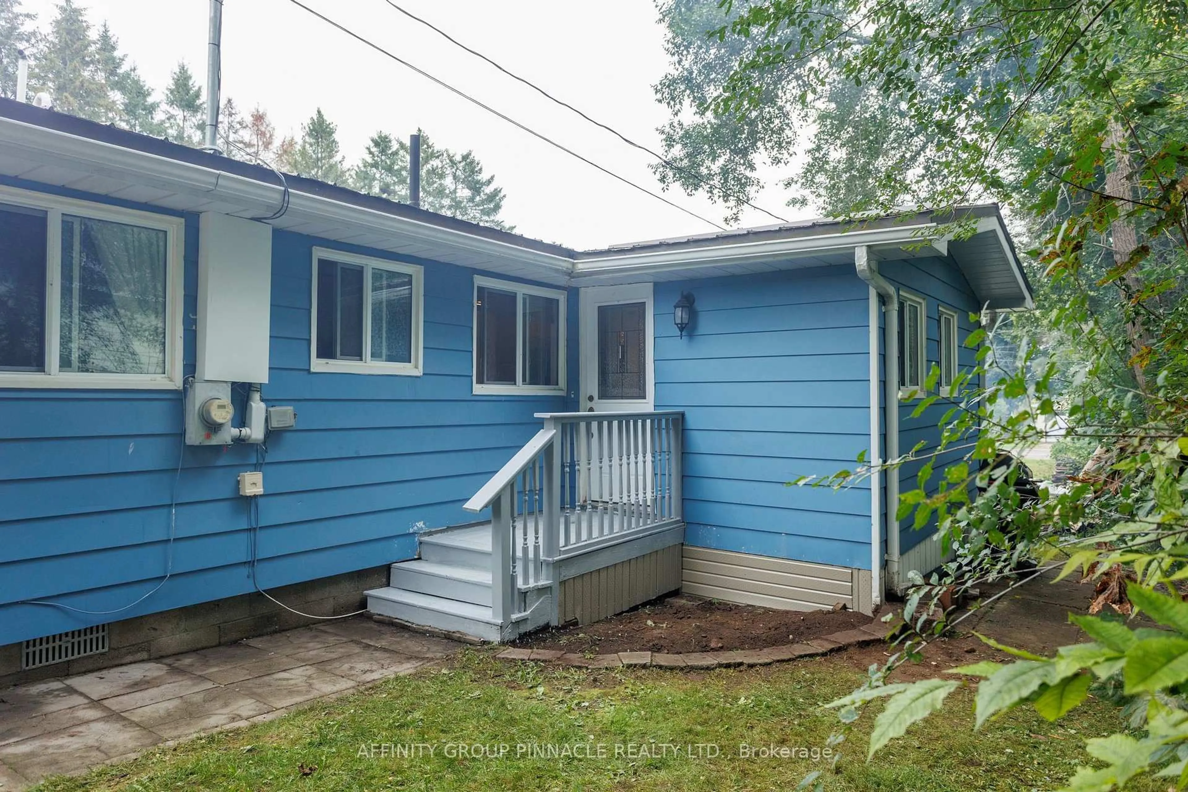 Home with vinyl exterior material, street for 124 Cameron Dr, Kawartha Lakes Ontario K0M 1G0