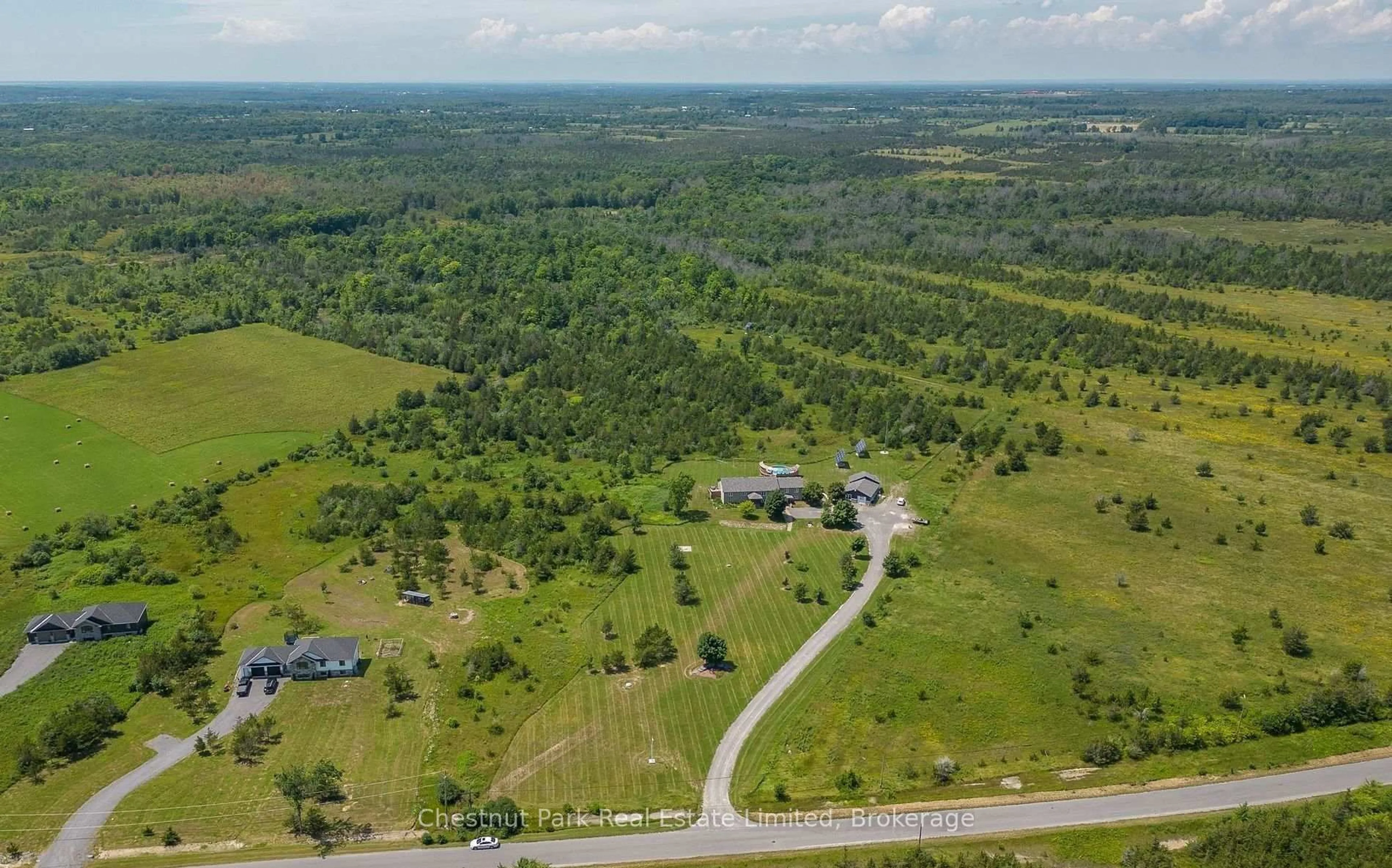 A pic from outside/outdoor area/front of a property/back of a property/a pic from drone, forest/trees view for 1398 Old Milford Rd, Prince Edward County Ontario K0K 2T0