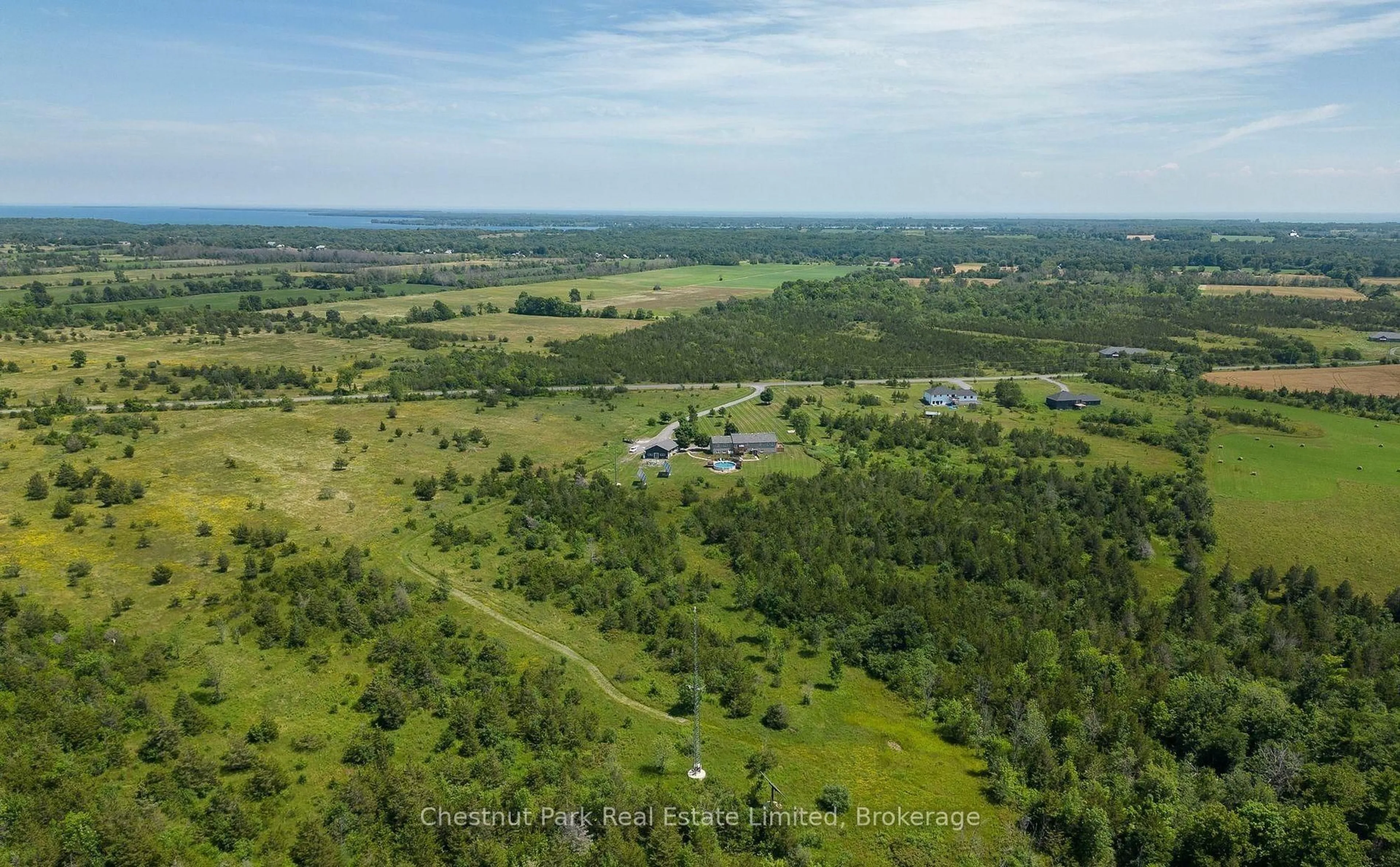 A pic from outside/outdoor area/front of a property/back of a property/a pic from drone, forest/trees view for 1398 Old Milford Rd, Prince Edward County Ontario K0K 2T0