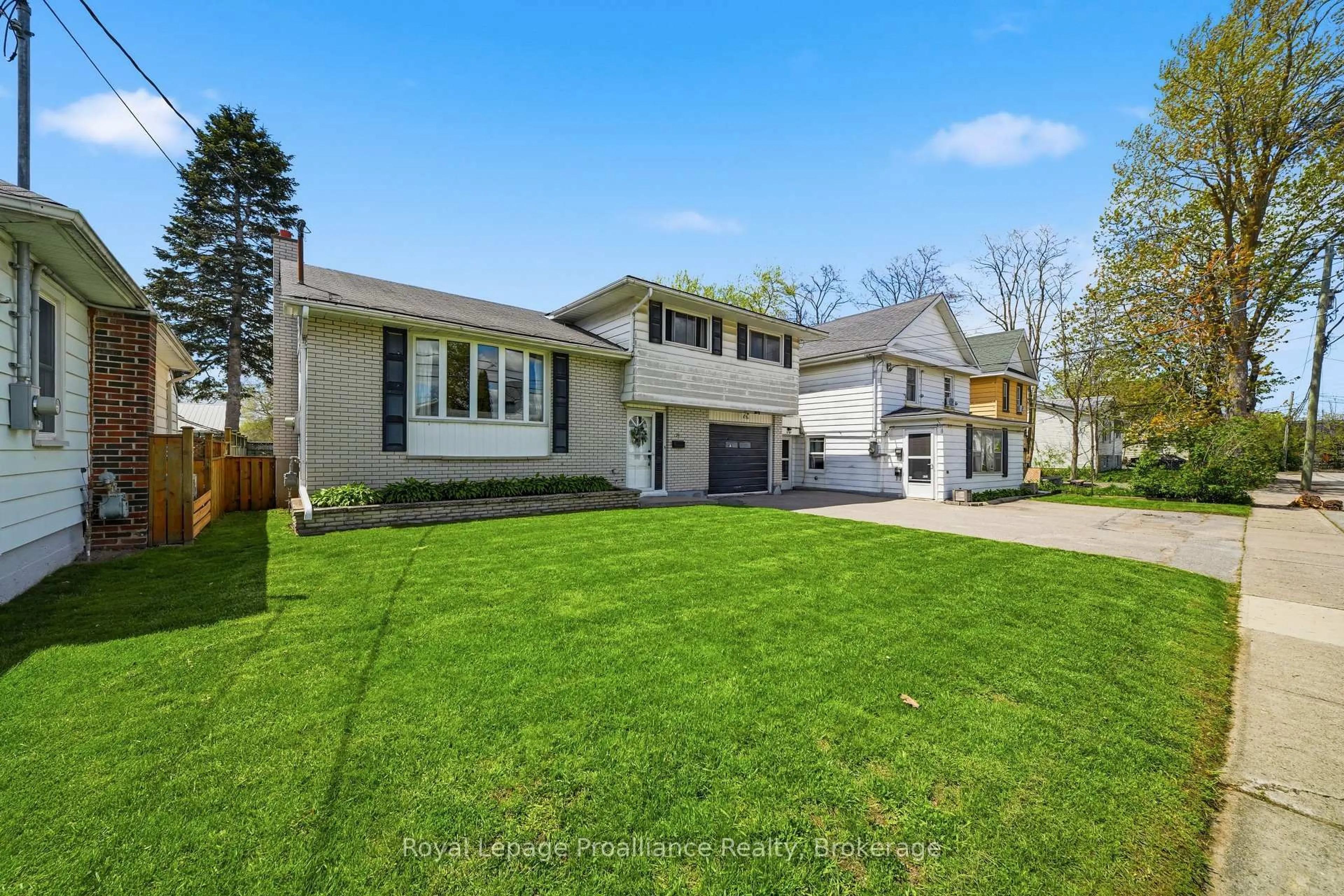Home with vinyl exterior material, street for 26 Johnson St, Belleville Ontario K8N 4T3