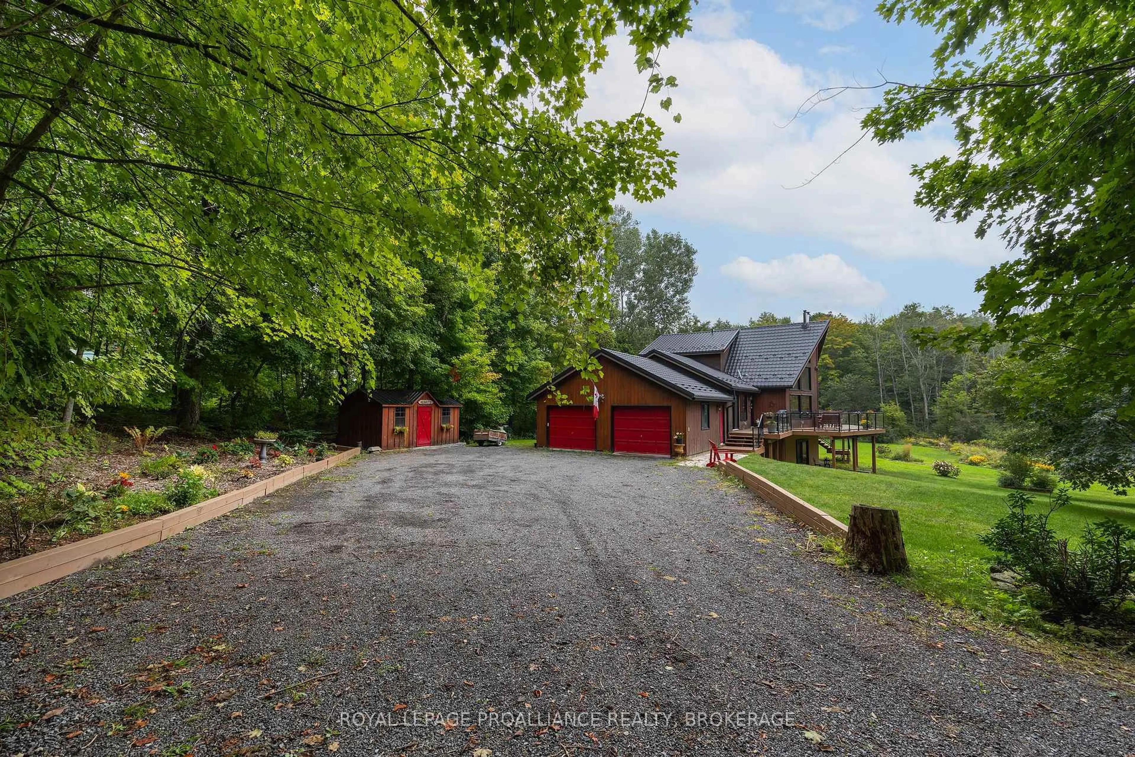 A pic from outside/outdoor area/front of a property/back of a property/a pic from drone, unknown for 5097 Highway 15, Seeley's Bay Ontario K0H 2N0