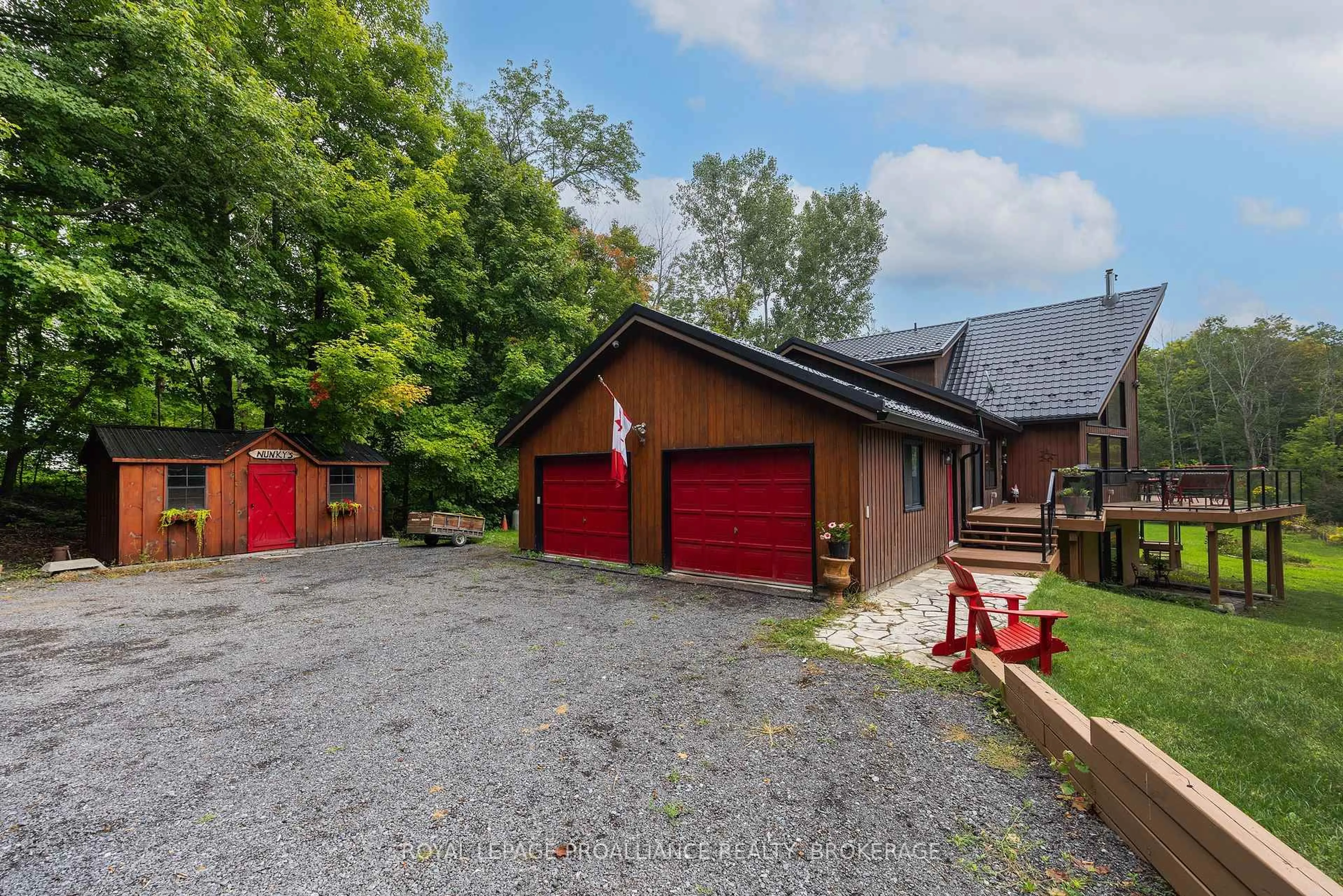 A pic from outside/outdoor area/front of a property/back of a property/a pic from drone, street for 5097 Highway 15, Seeley's Bay Ontario K0H 2N0