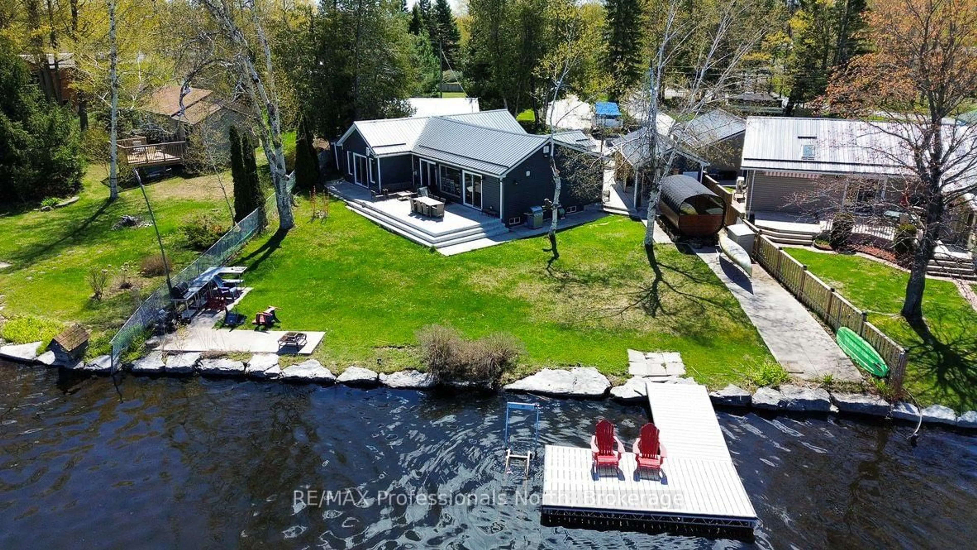 A pic from outside/outdoor area/front of a property/back of a property/a pic from drone, water/lake/river/ocean view for 652 Robel Dr, Selwyn Ontario K0L 1T0