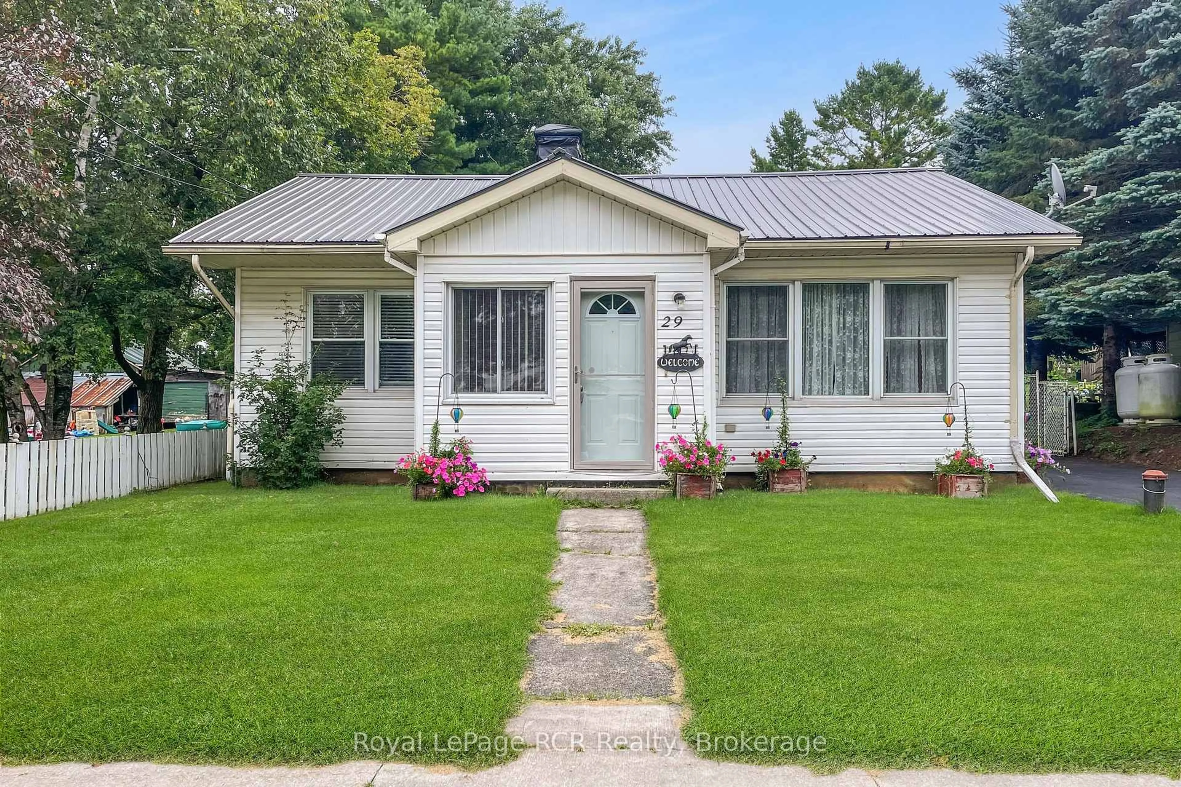 Home with vinyl exterior material, street for 29 Main St, West Grey Ontario N0G 1S0