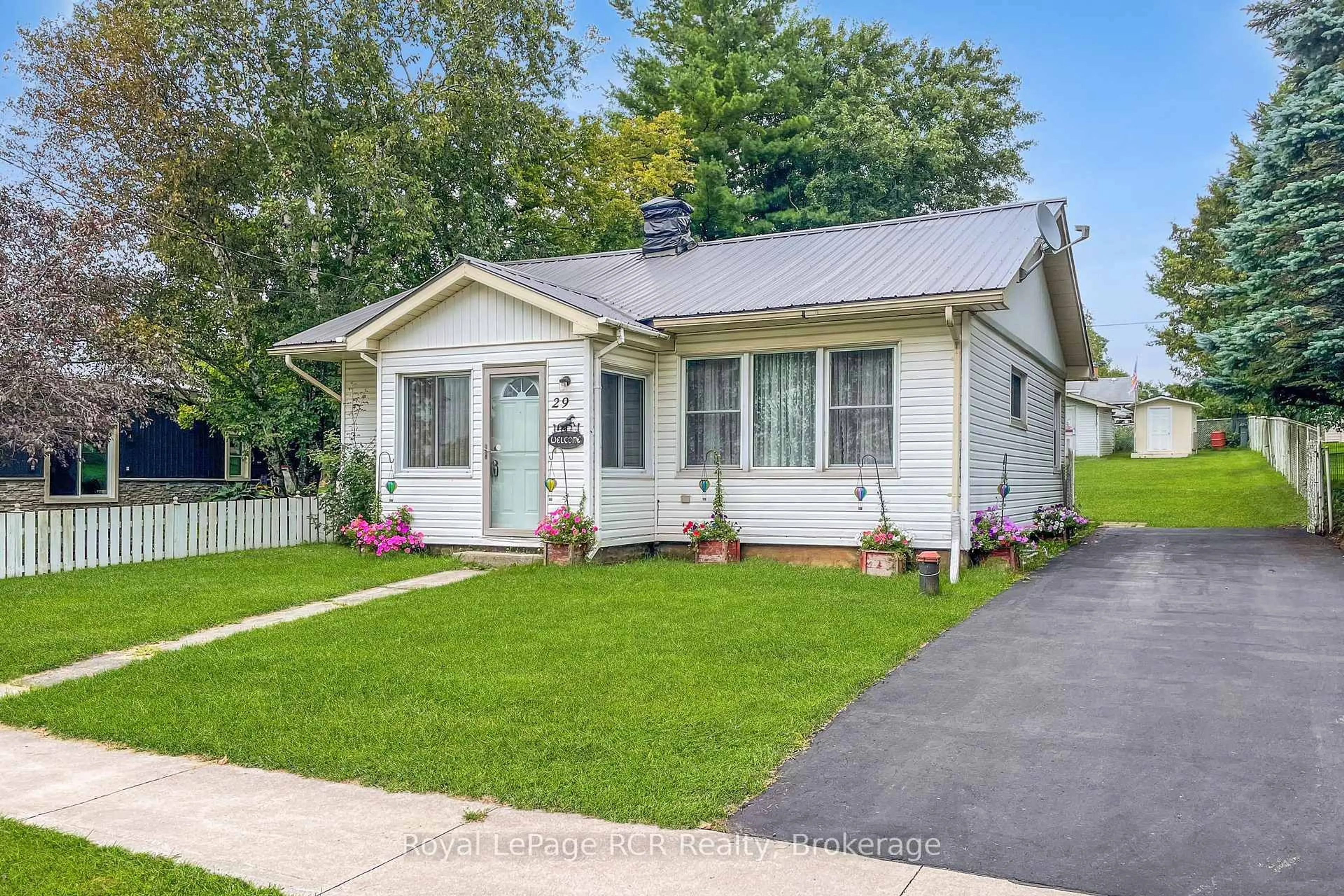 Home with vinyl exterior material, street for 29 Main St, West Grey Ontario N0G 1S0