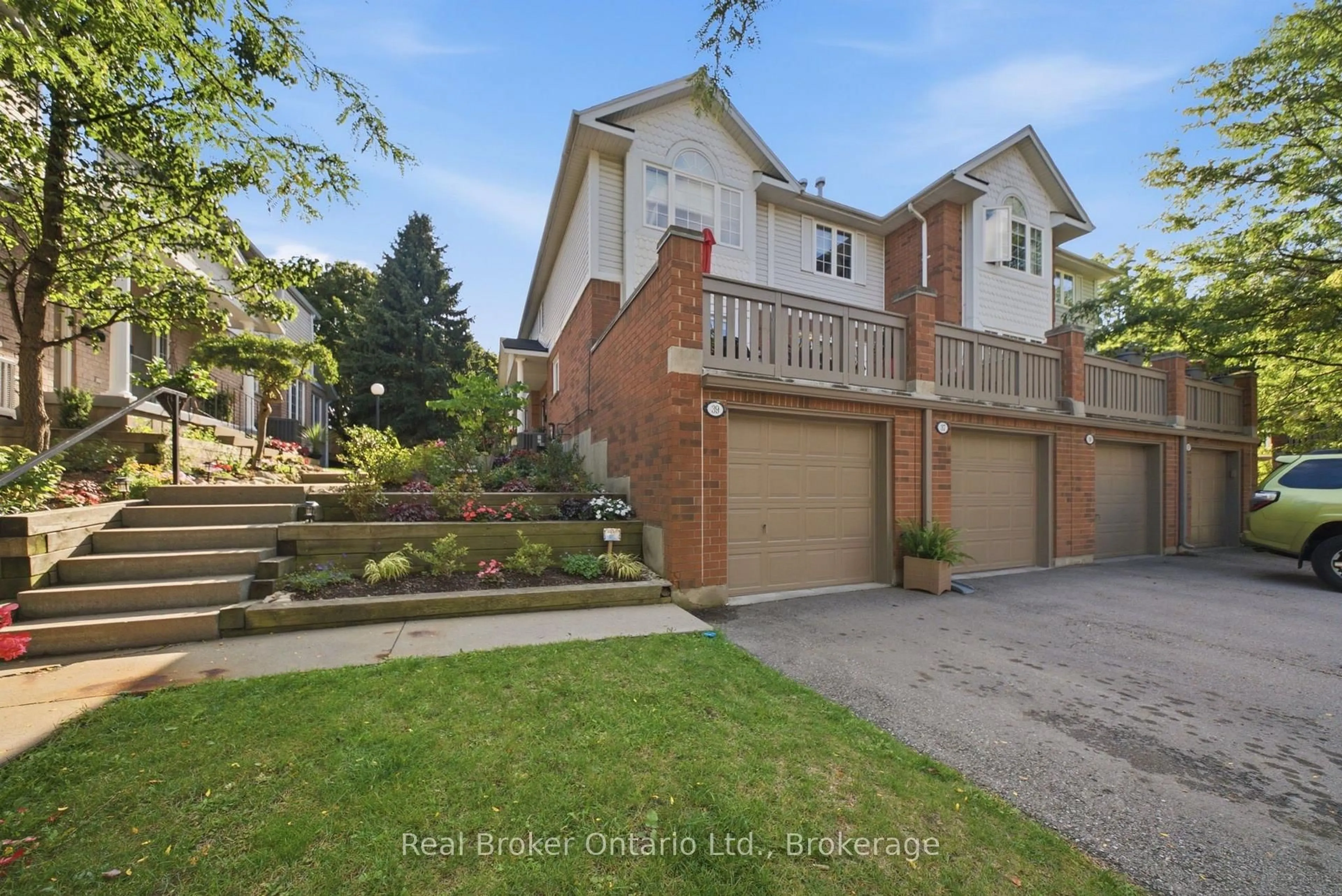 A pic from outside/outdoor area/front of a property/back of a property/a pic from drone, street for 941 Gordon St #37, Guelph Ontario N1G 4R9