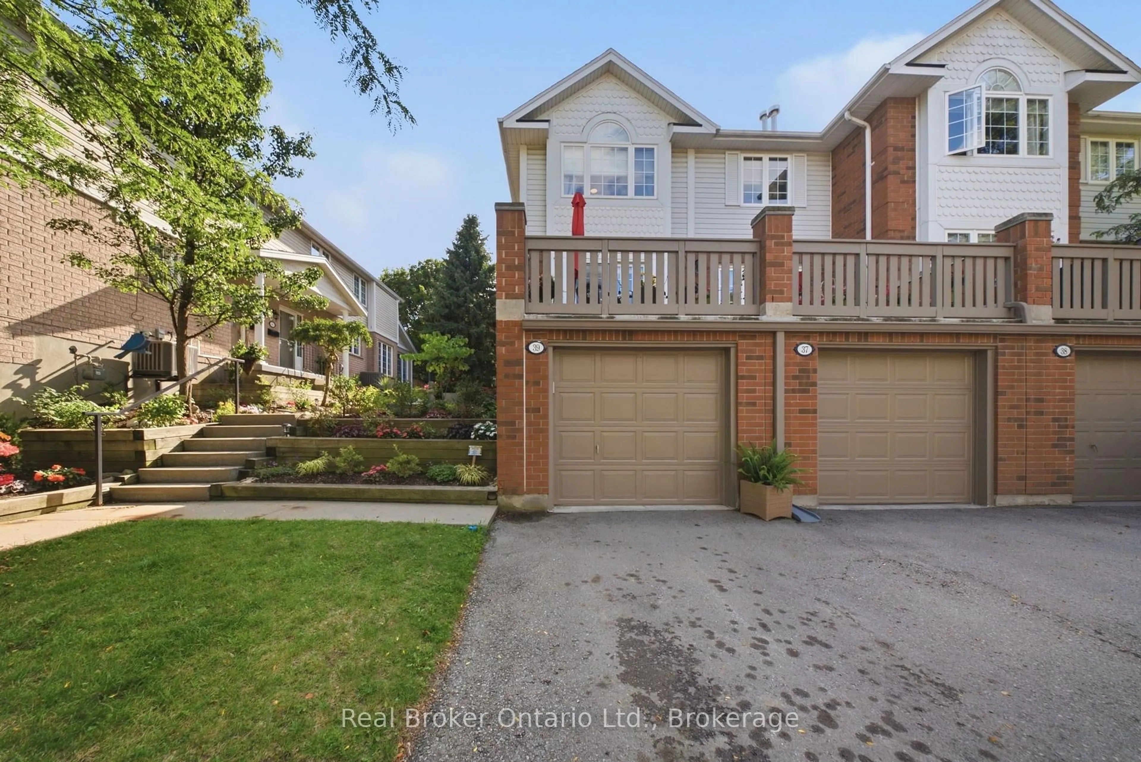A pic from outside/outdoor area/front of a property/back of a property/a pic from drone, street for 941 Gordon St #37, Guelph Ontario N1G 4R9