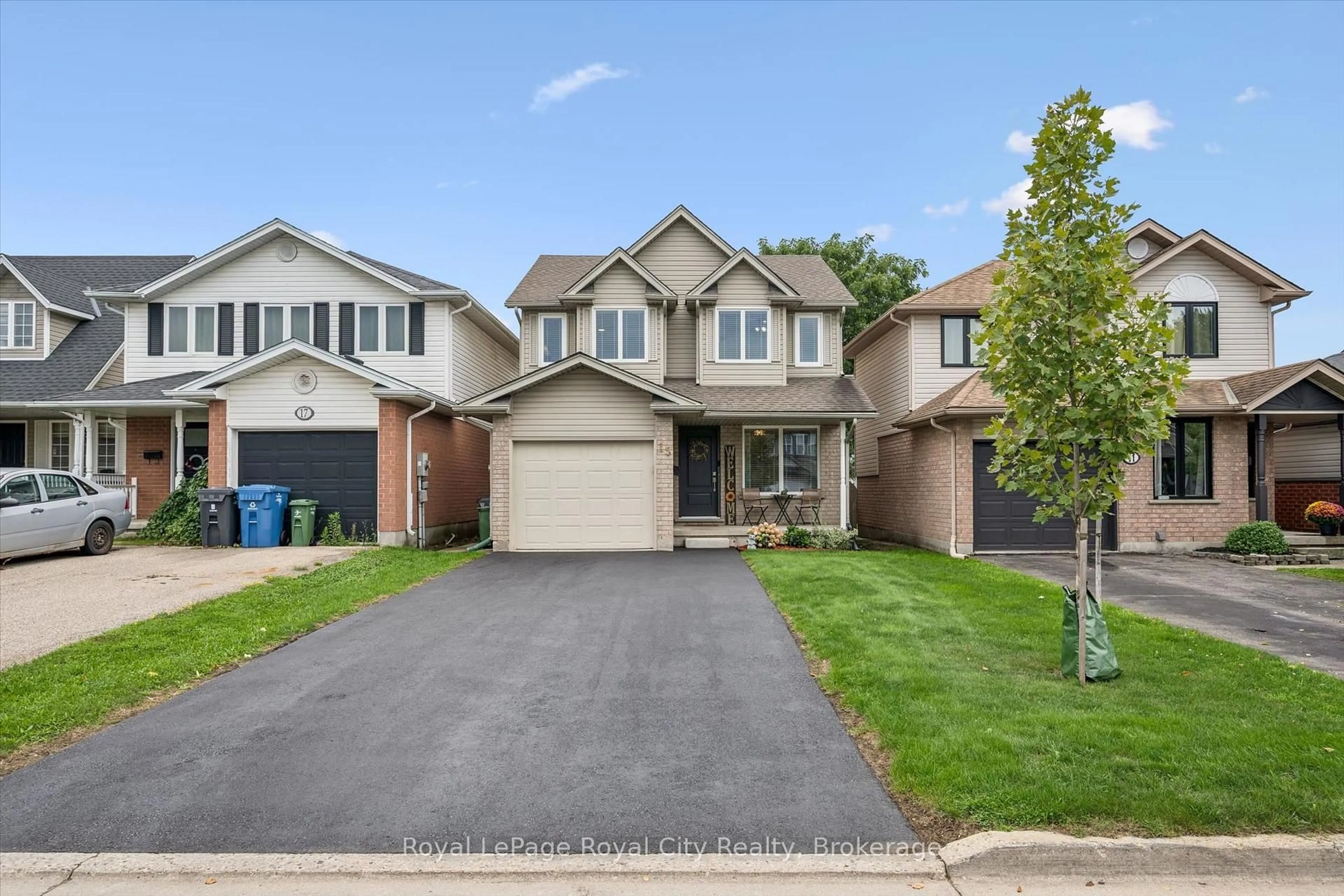 Home with brick exterior material, street for 15 Trailbrook Lane, Guelph Ontario N1E 7B6
