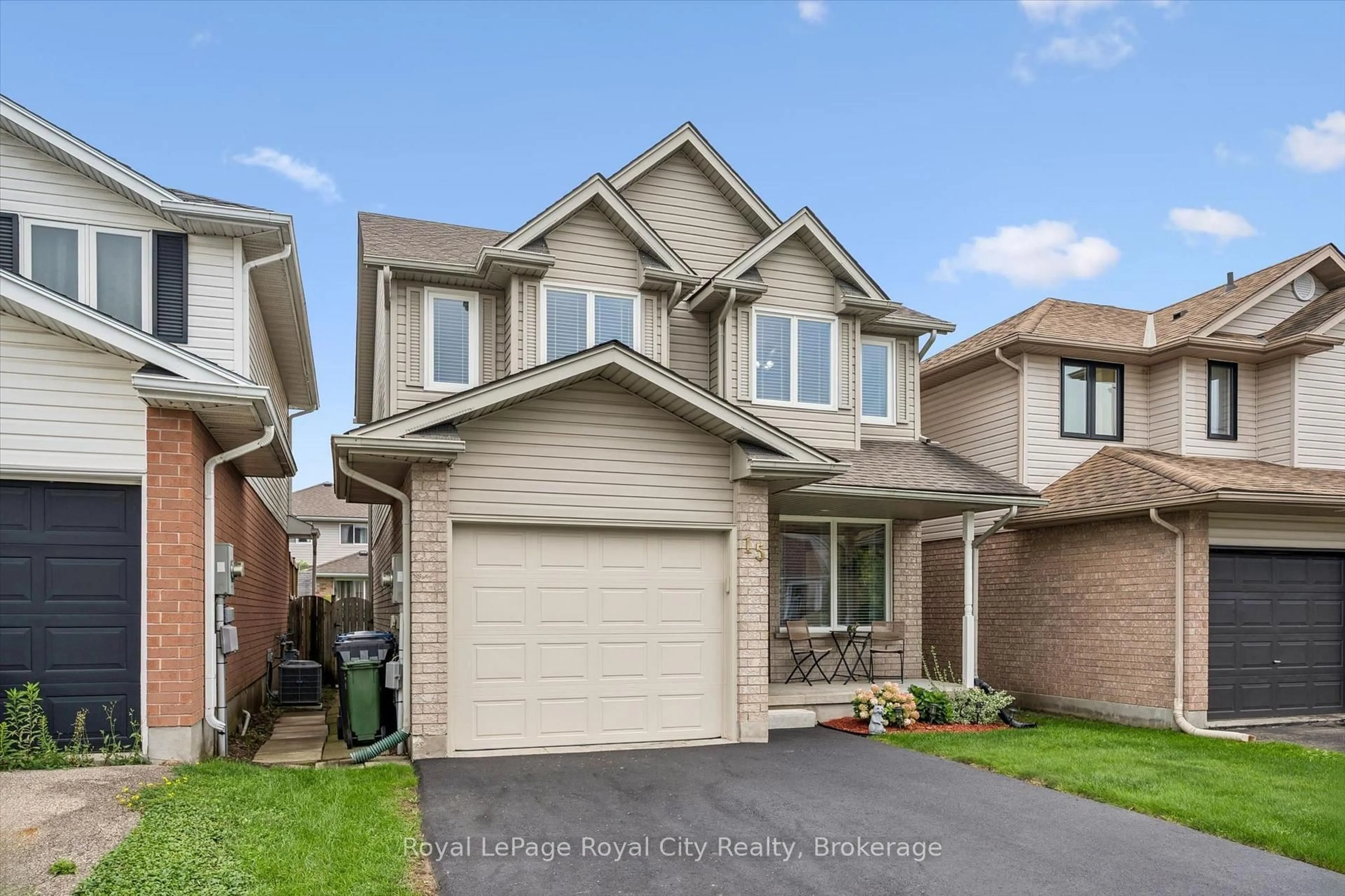 Home with brick exterior material, street for 15 Trailbrook Lane, Guelph Ontario N1E 7B6