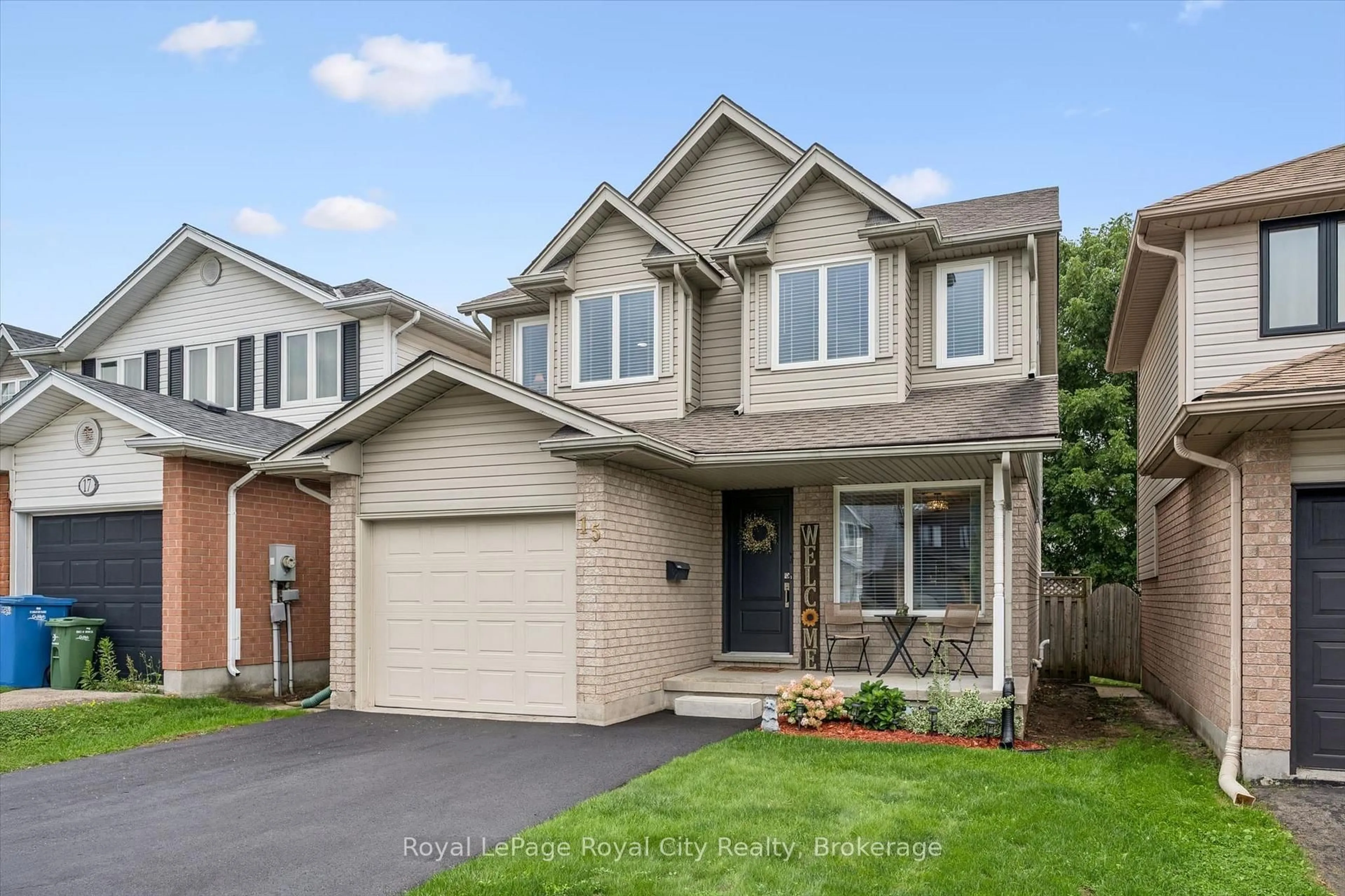 Home with brick exterior material, street for 15 Trailbrook Lane, Guelph Ontario N1E 7B6