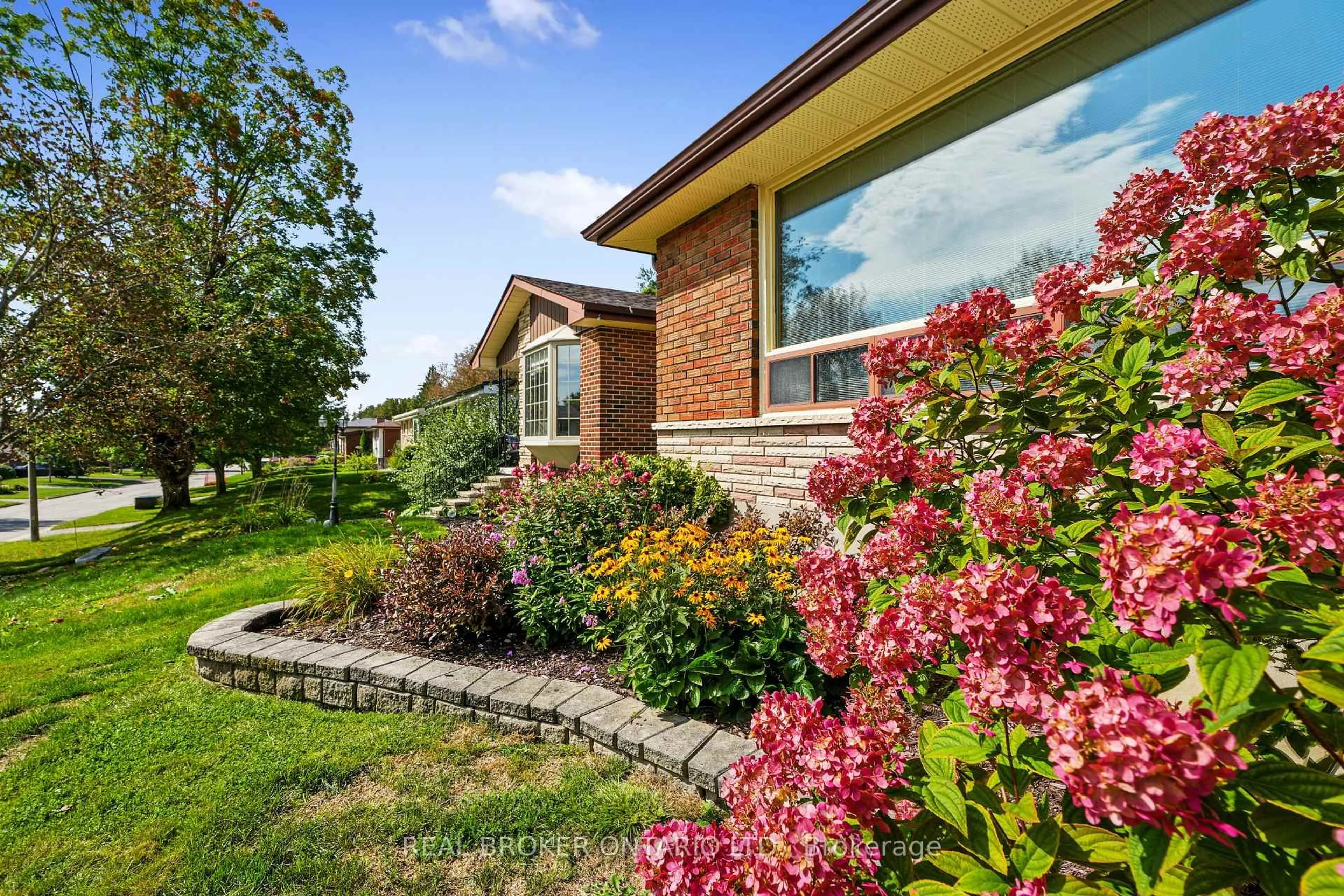 Home with brick exterior material, street for 1311 Edmison Dr, Peterborough Ontario K9H 6V2