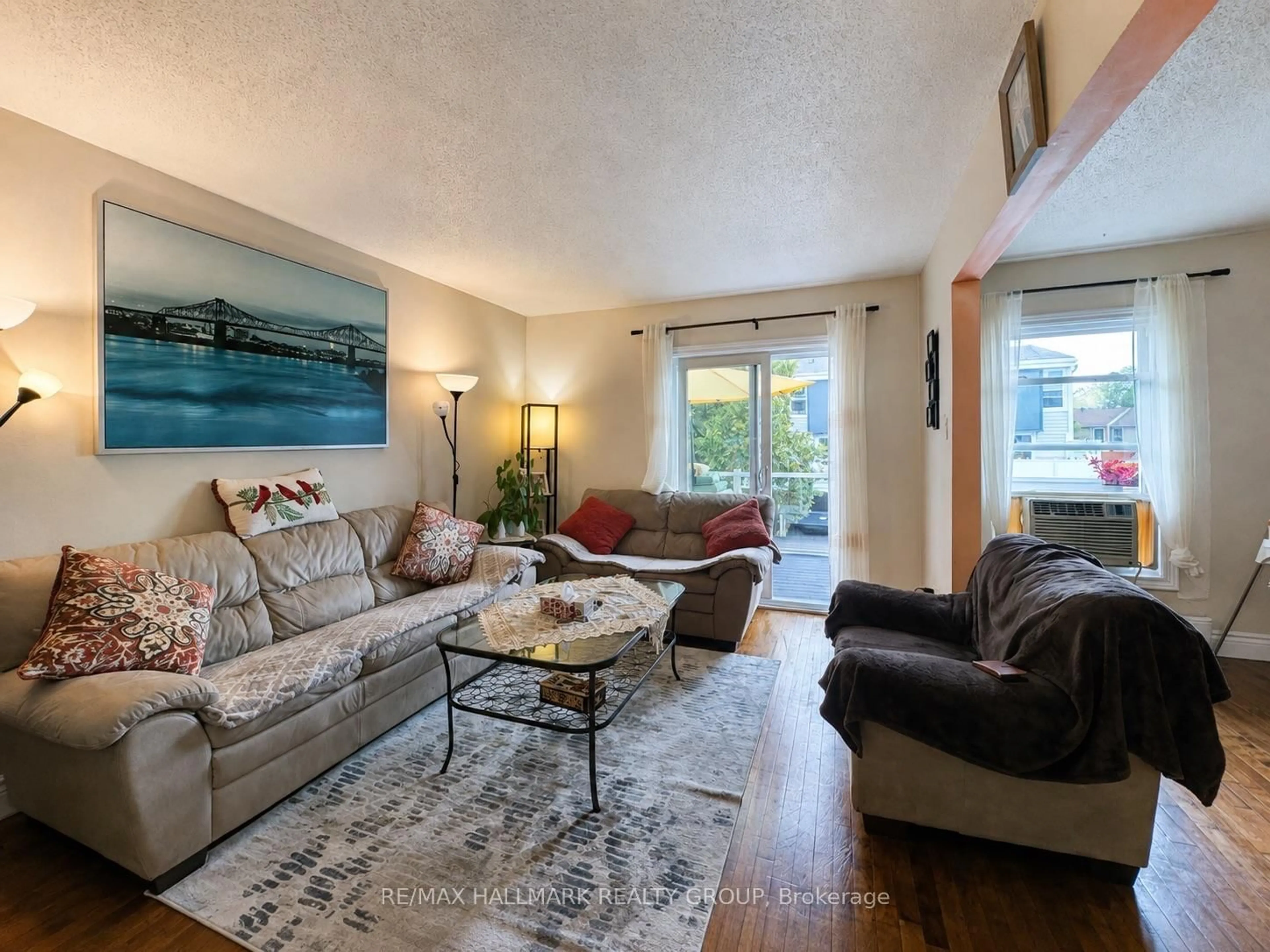 Living room with furniture, unknown for 825 Cahill Dr #163, Ottawa Ontario K1V 9N7