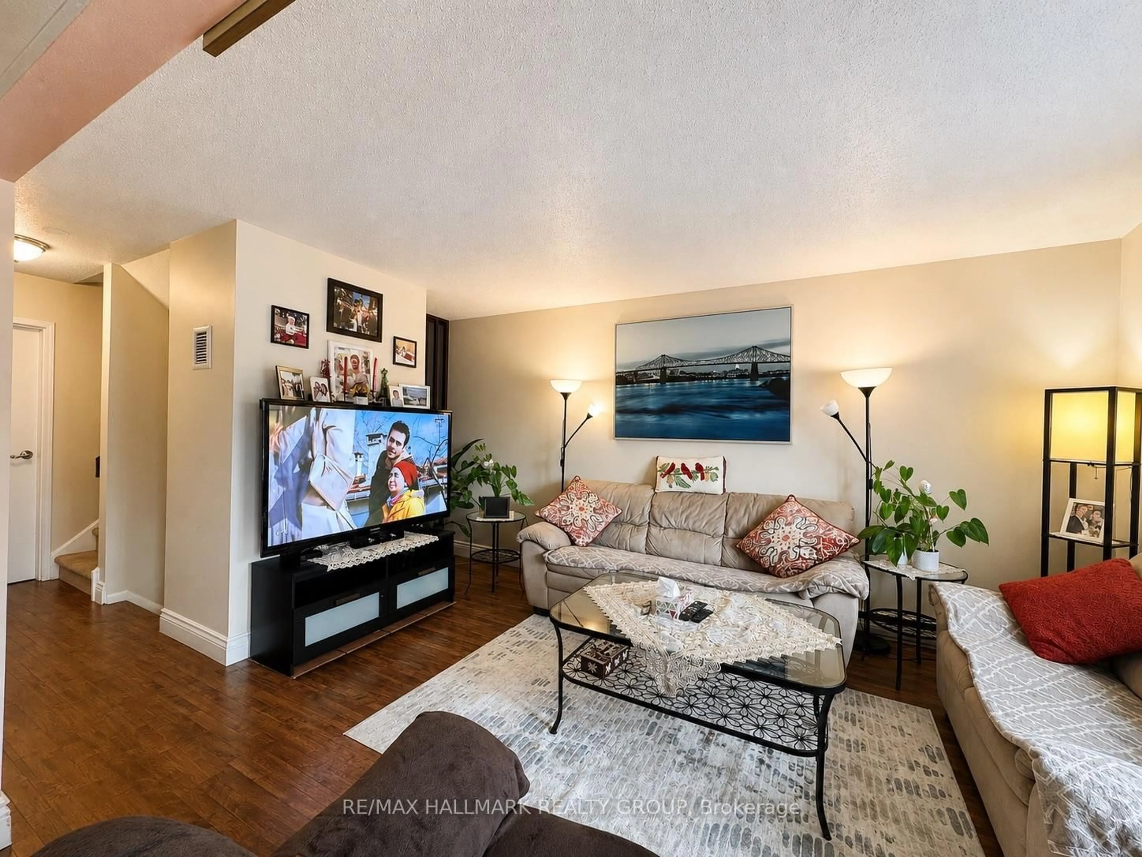 Living room with furniture, unknown for 825 Cahill Dr #163, Ottawa Ontario K1V 9N7