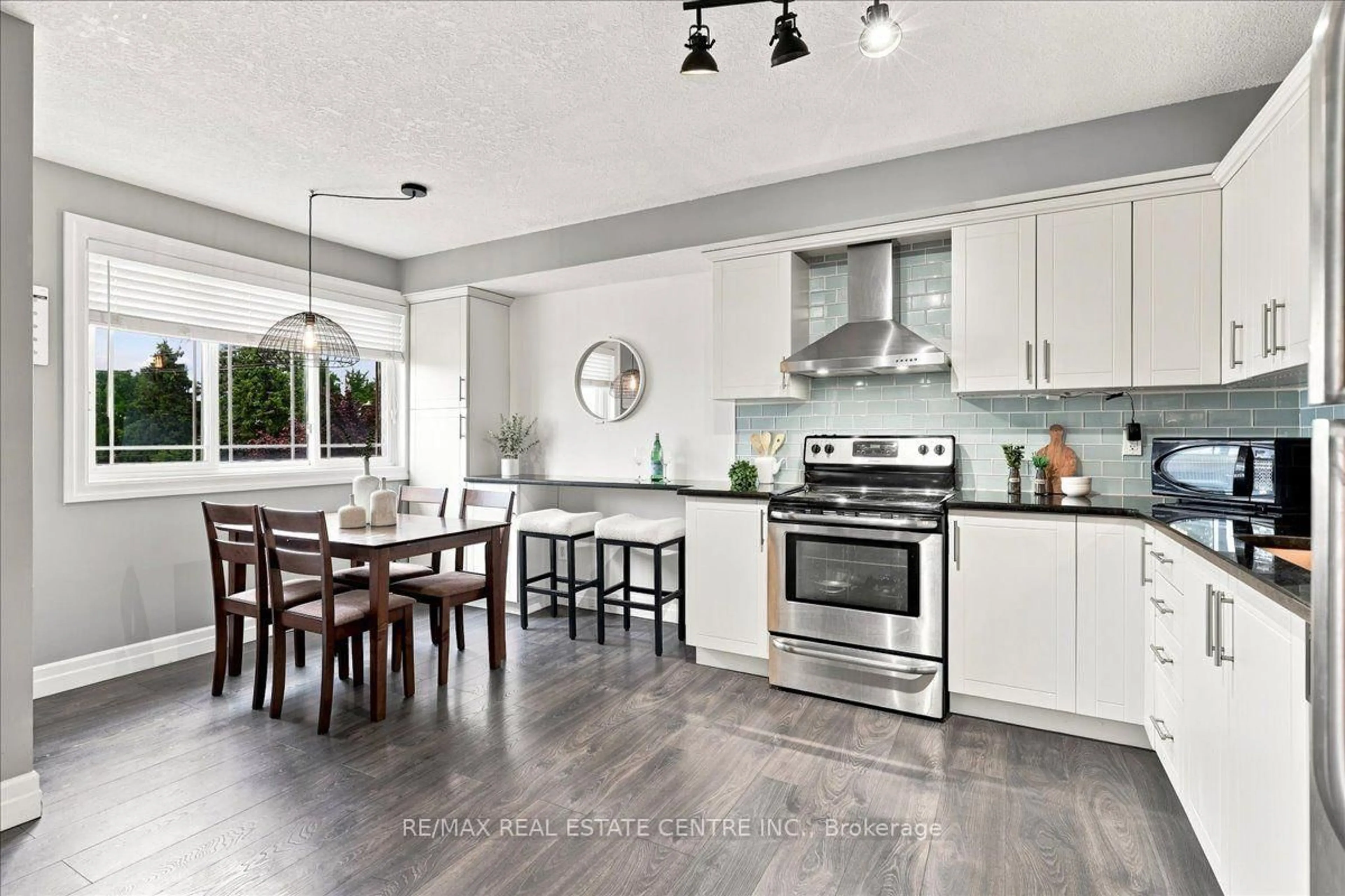 Open concept kitchen, ceramic/tile floor for 1522 King St #403, Kitchener Ontario N2G 2P1