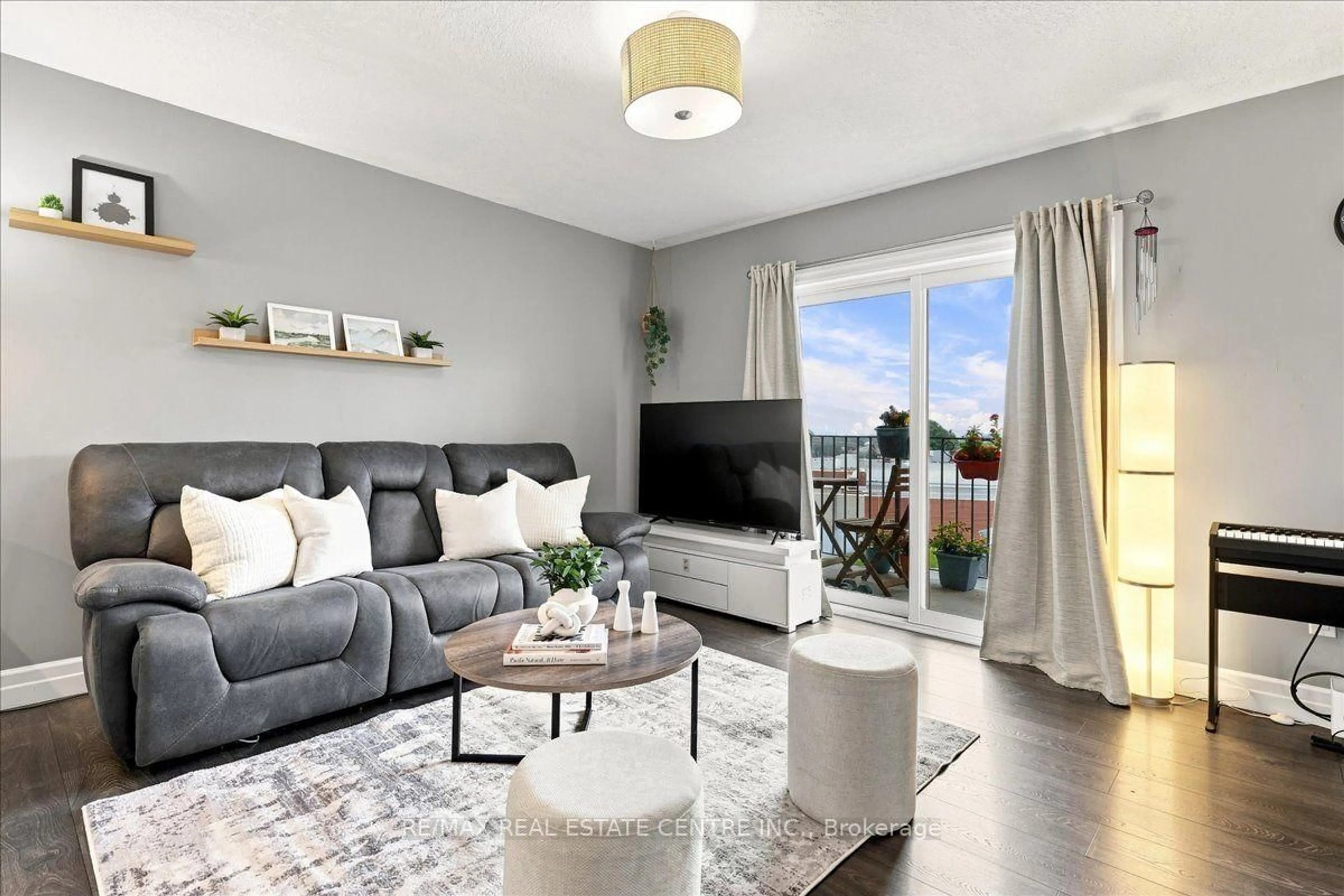Living room with furniture, unknown for 1522 King St #403, Kitchener Ontario N2G 2P1