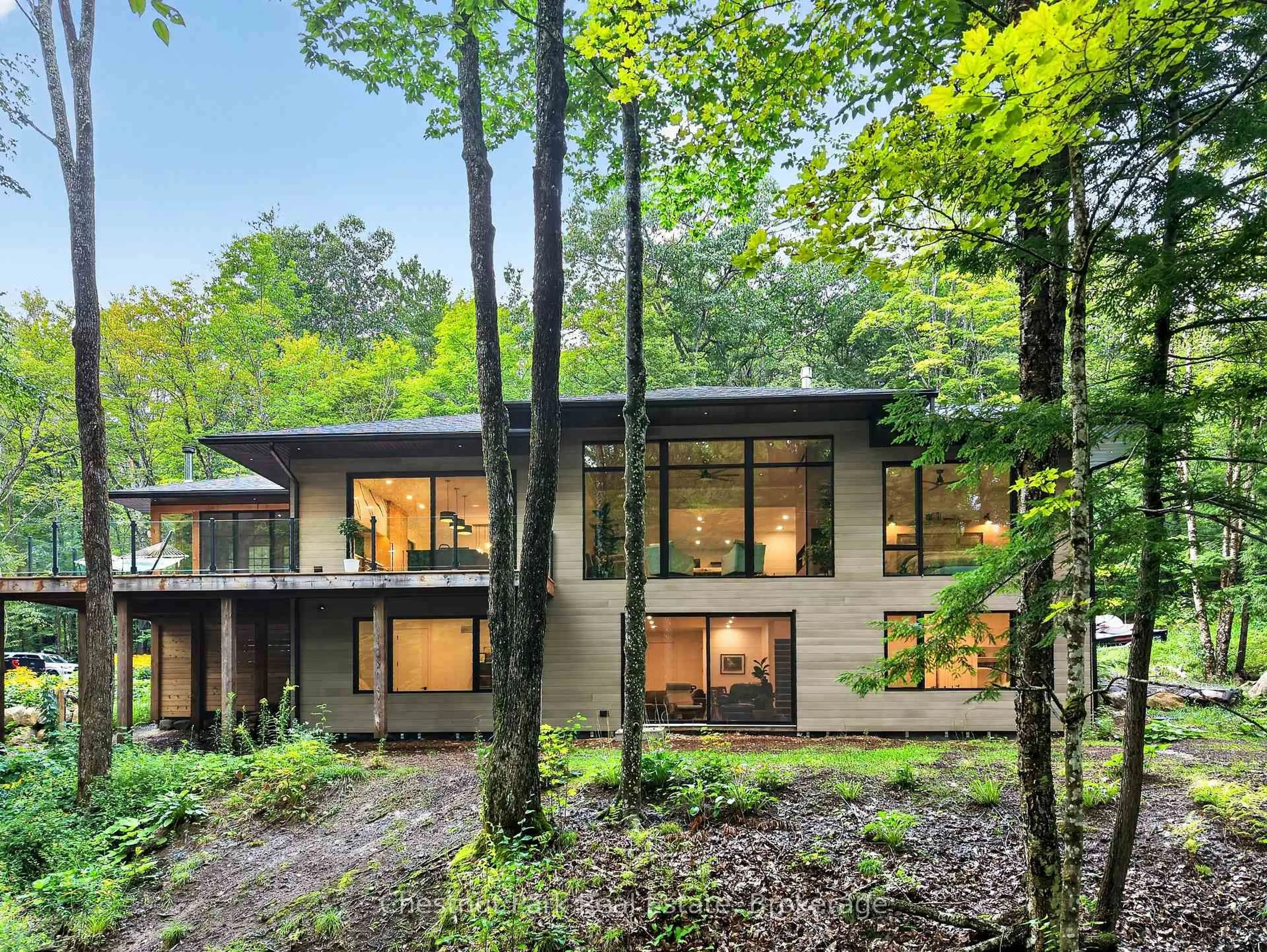 Home with brick exterior material, forest/trees view for 1267 Dawson Rd, Muskoka Lakes Ontario P0B 1M0