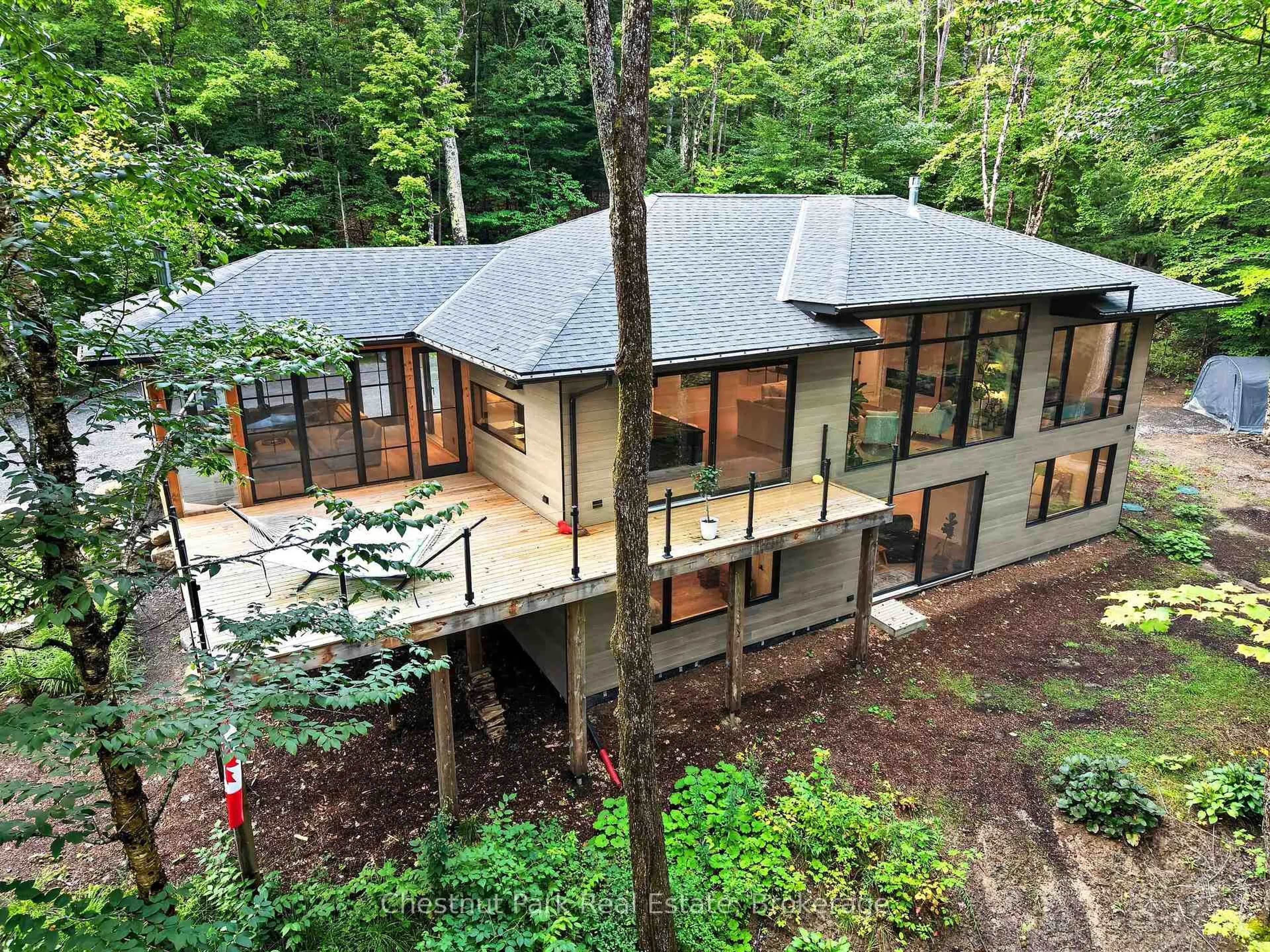 A pic from outside/outdoor area/front of a property/back of a property/a pic from drone, forest/trees view for 1267 Dawson Rd, Muskoka Lakes Ontario P0B 1M0