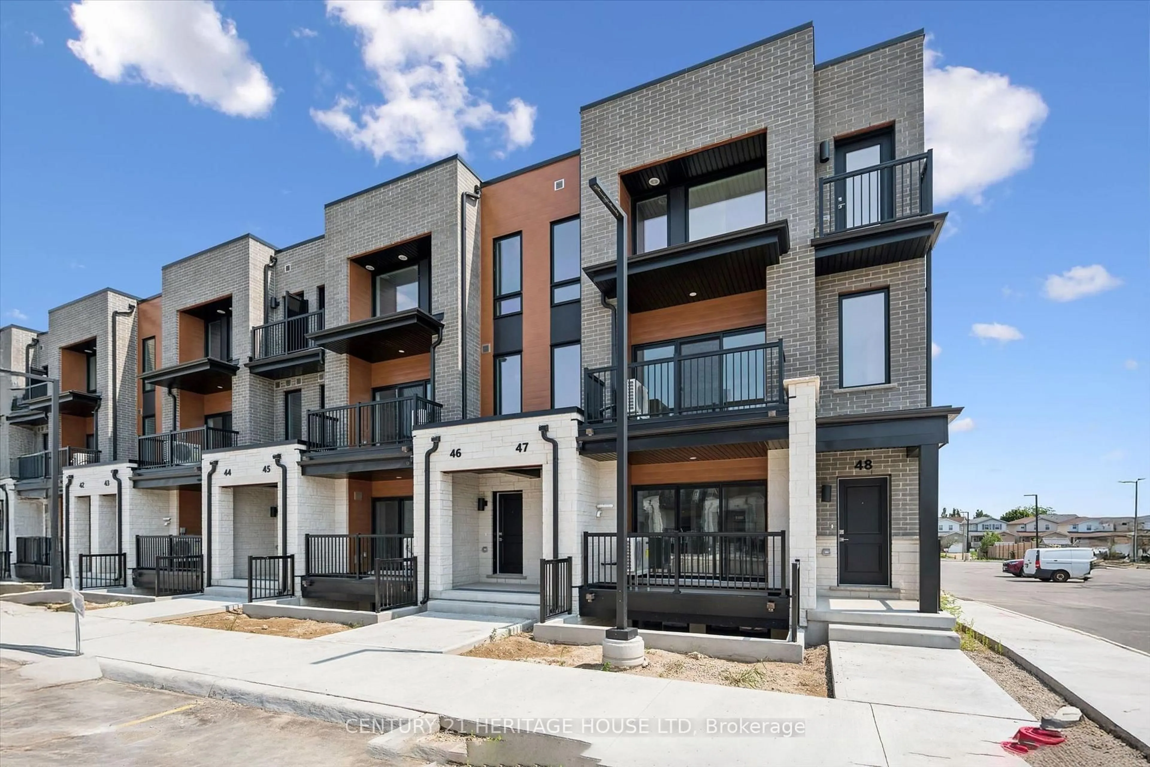 Home with brick exterior material, street for 525 Erinbrook Dr #B047, Kitchener Ontario N2E 0L4