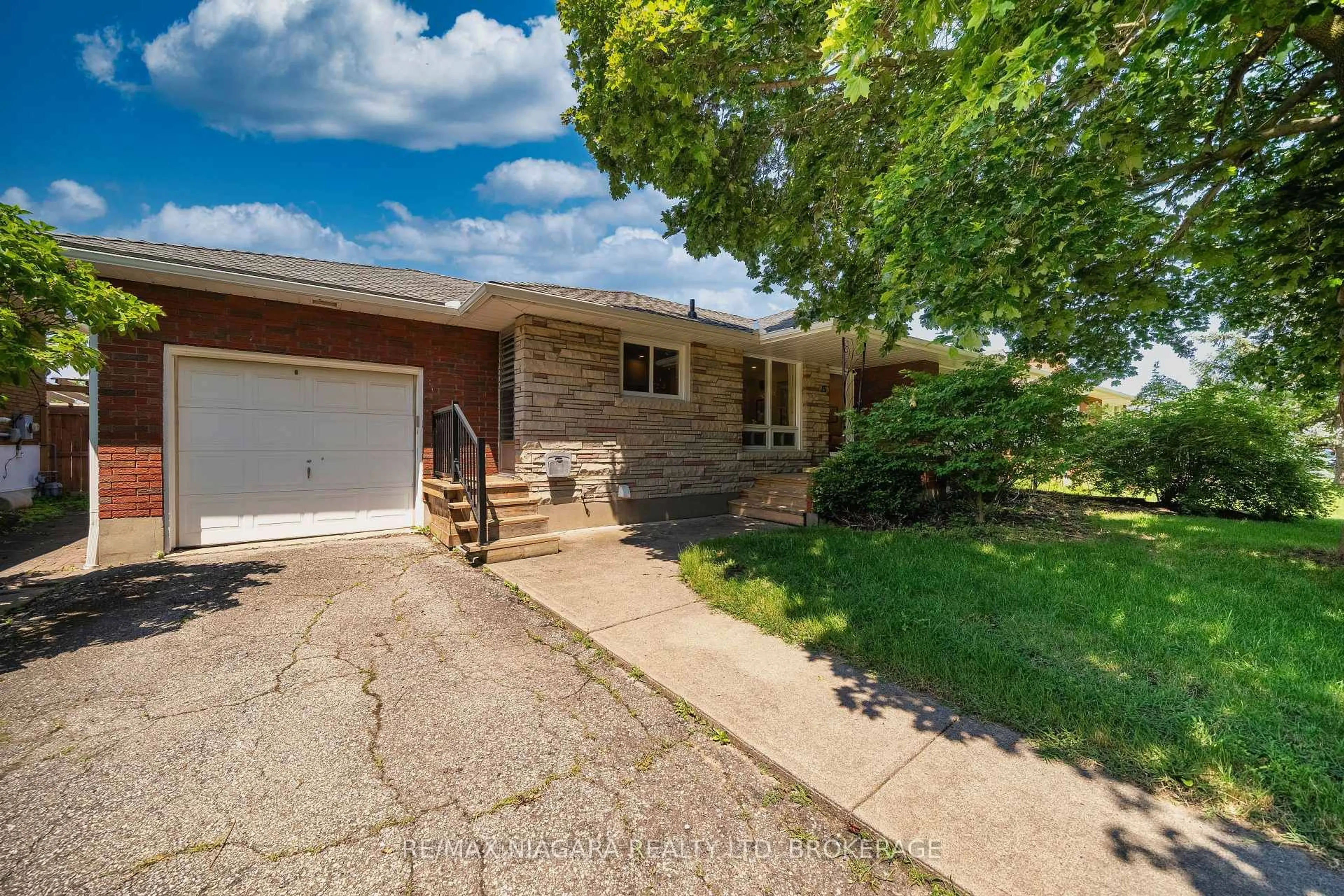 Home with brick exterior material, street for 15 Springbank Dr, St. Catharines Ontario L2S 2K1