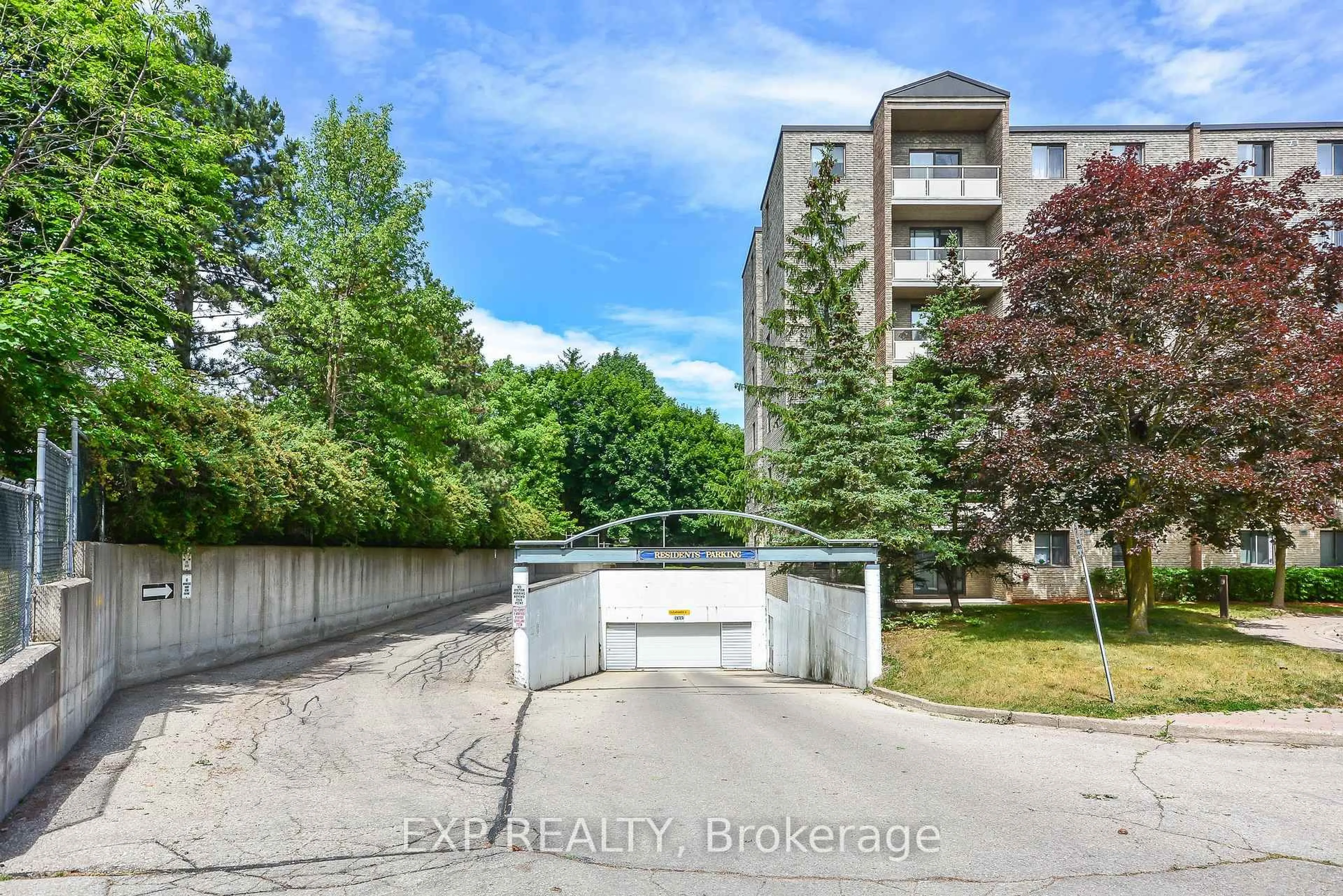 A pic from outside/outdoor area/front of a property/back of a property/a pic from drone, unknown for 93 Westwood Rd #301, Guelph Ontario N1H 7J7