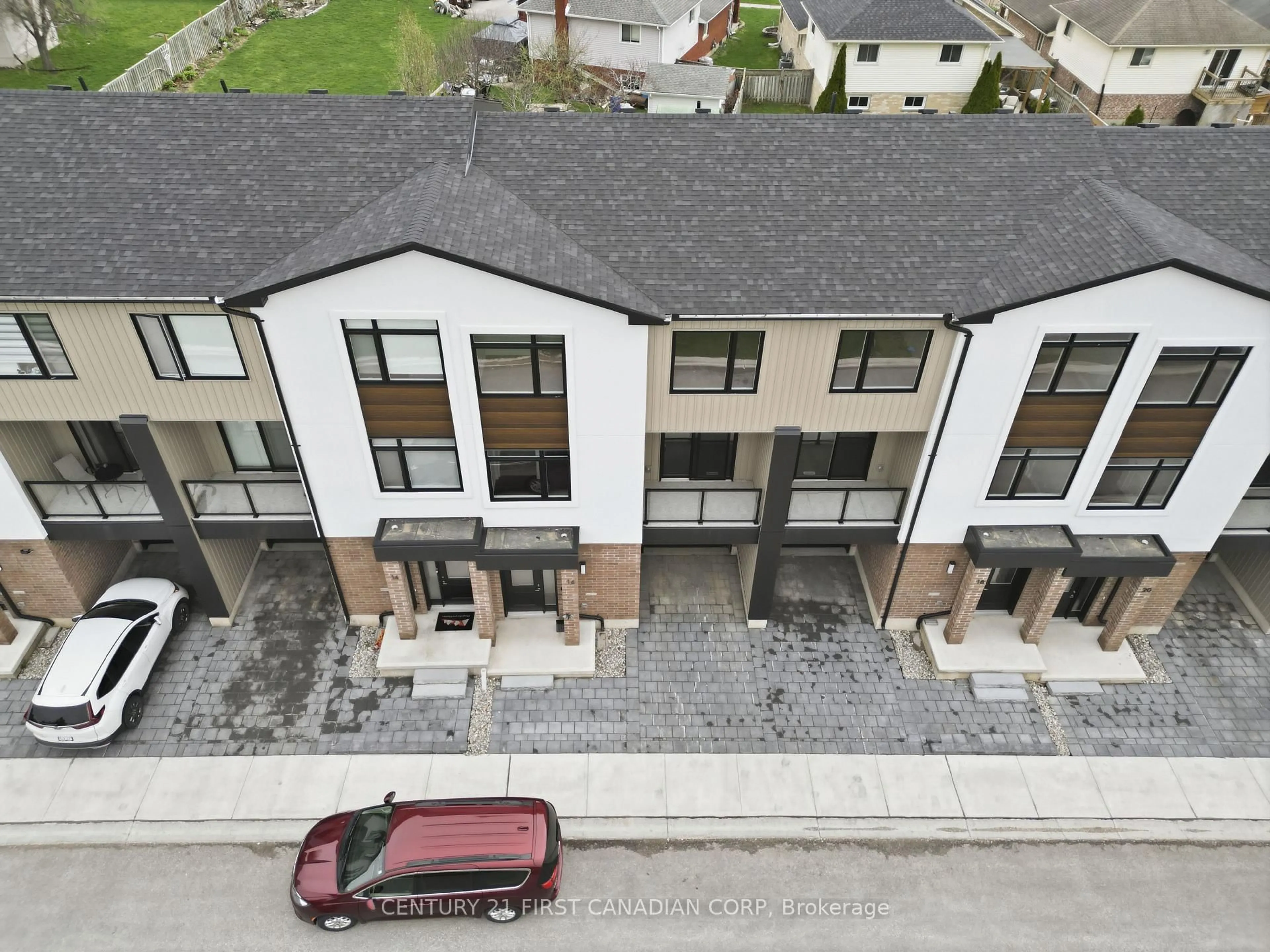 A pic from outside/outdoor area/front of a property/back of a property/a pic from drone, street for 349 Southdale Rd #16, London South Ontario N6E 0B9