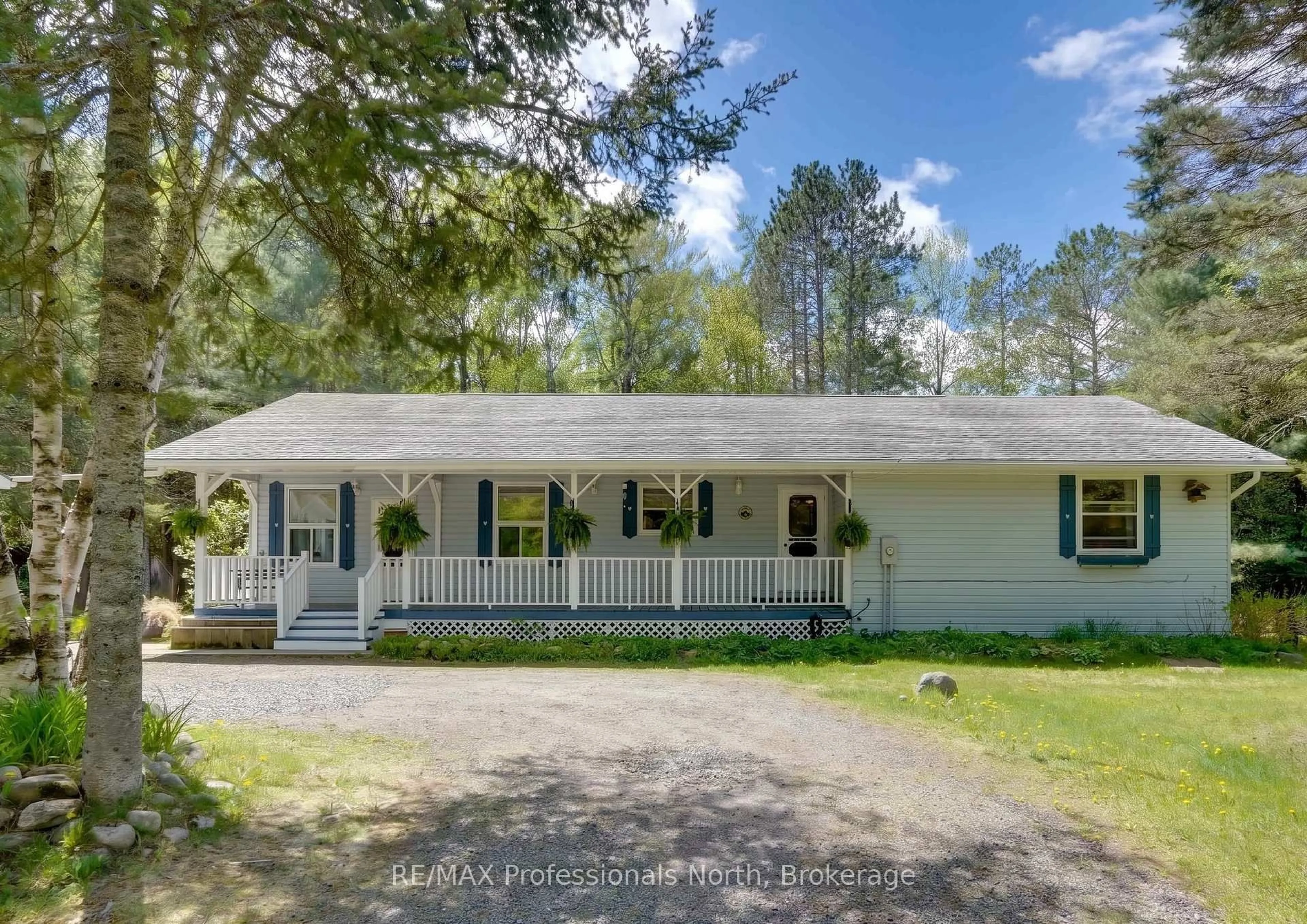 Home with vinyl exterior material, street for 2593 Brunel Rd, Huntsville Ontario P1H 2J3