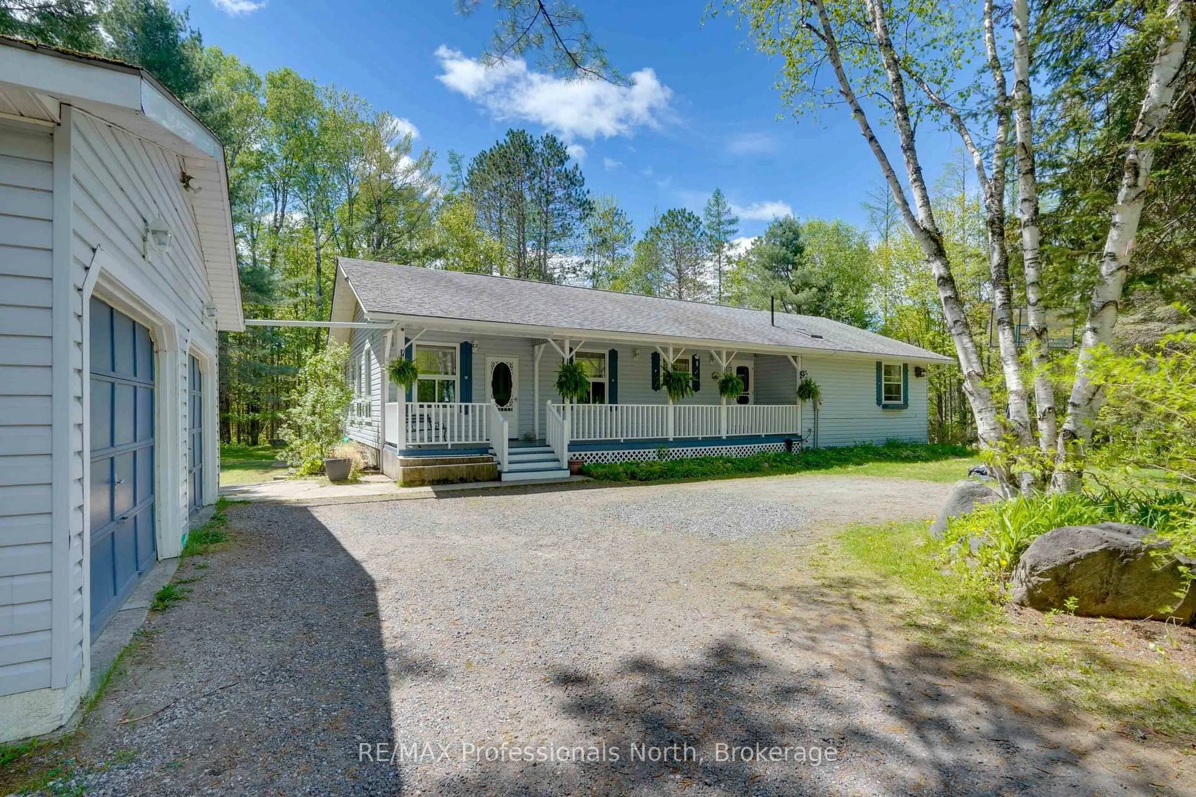 A pic from outside/outdoor area/front of a property/back of a property/a pic from drone, street for 2593 Brunel Rd, Huntsville Ontario P1H 2J3