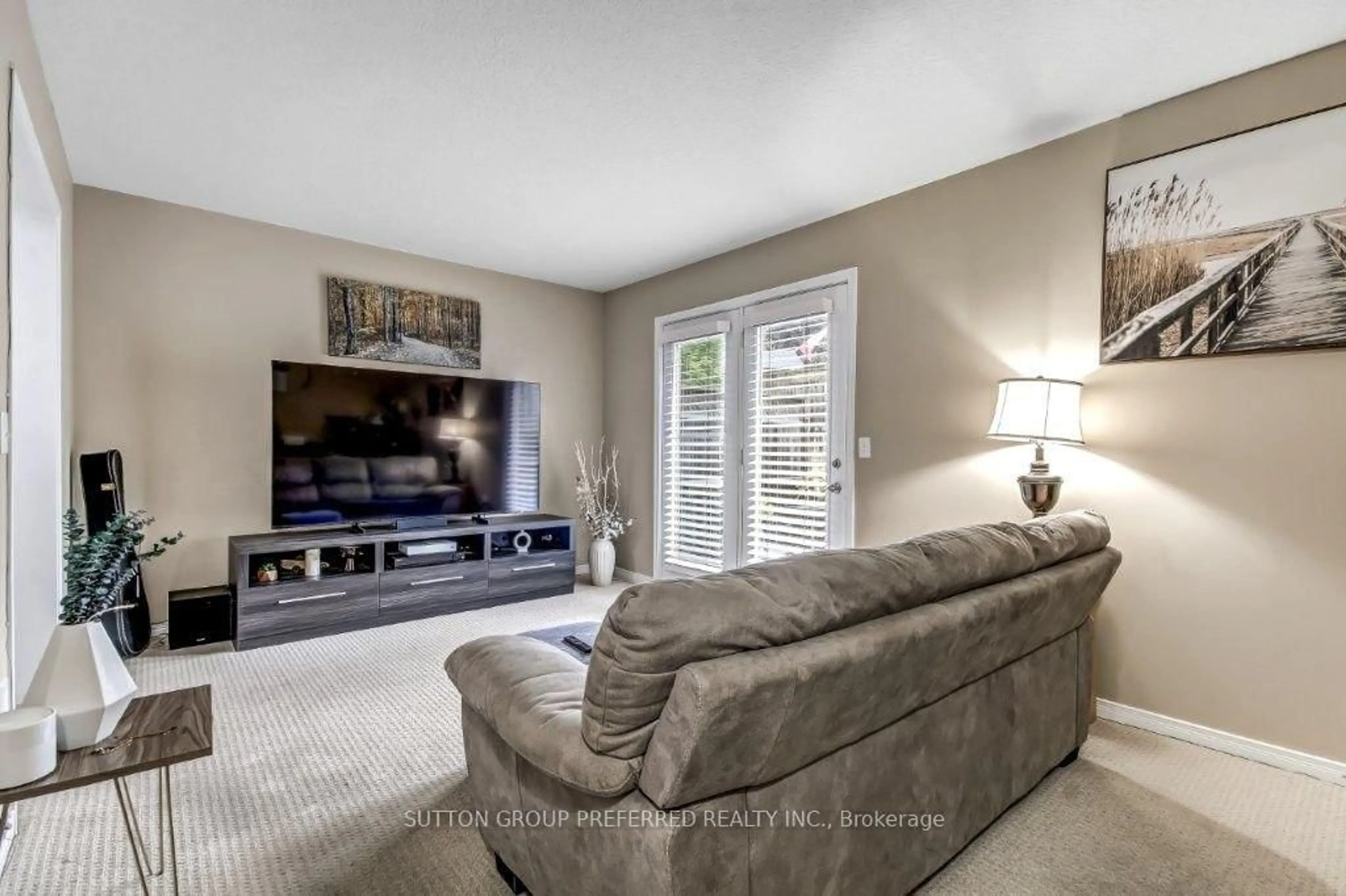 Living room with furniture, unknown for 2145 North Routledge Park #8, London North Ontario N6G 0J8