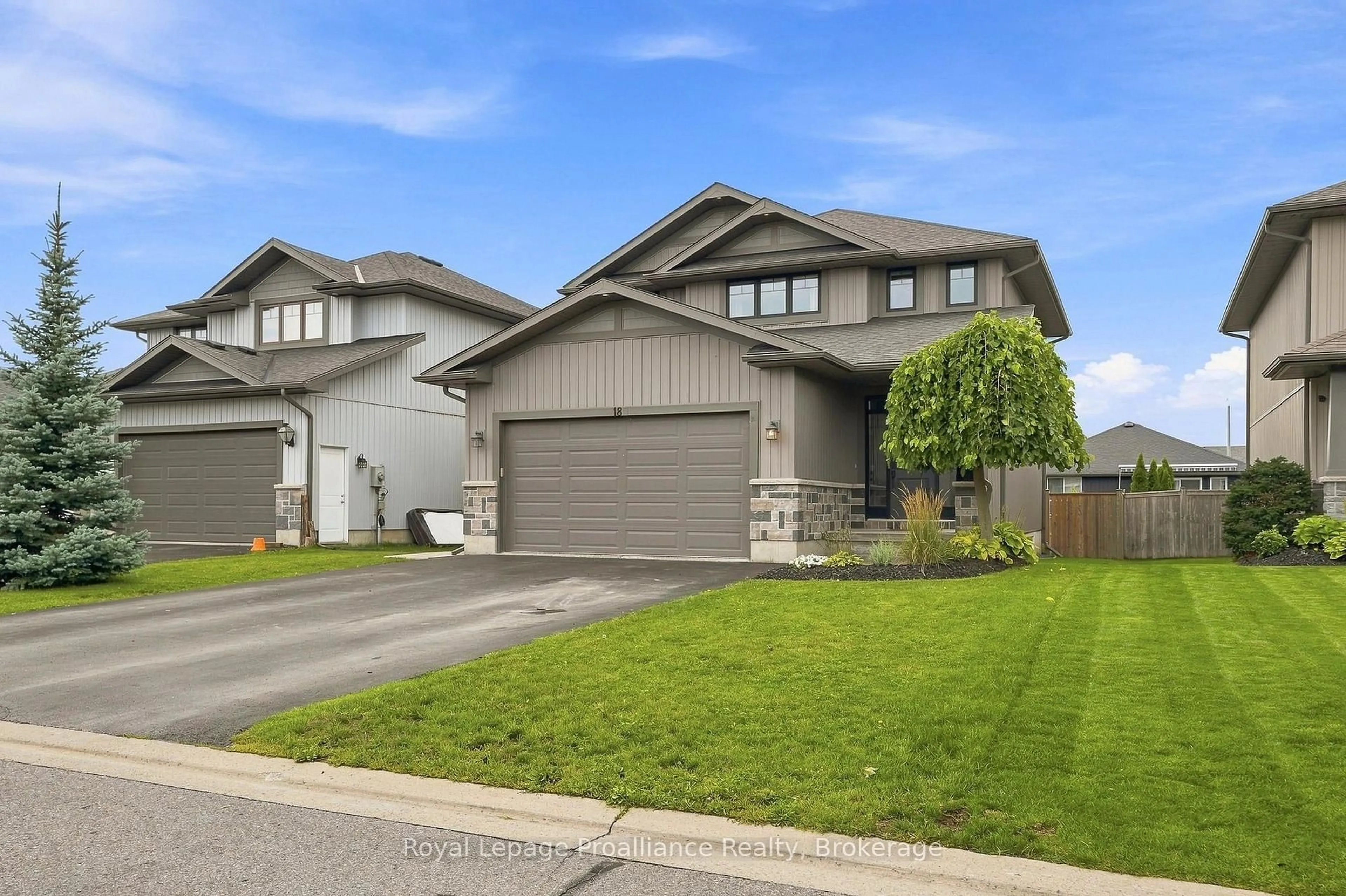 Home with vinyl exterior material, street for 18 Granite Dr, Belleville Ontario K8P 0C6