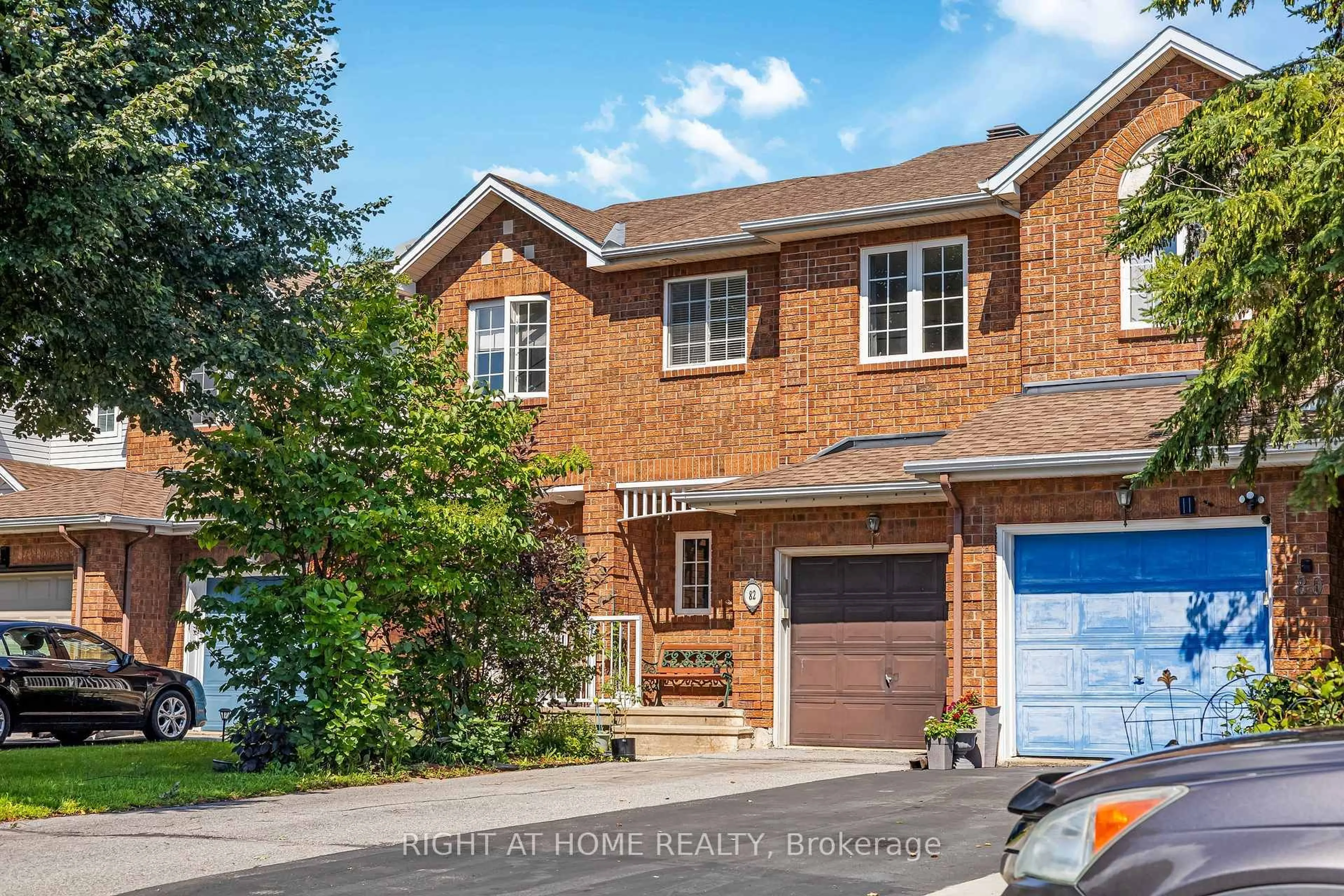 Home with brick exterior material, street for 82 Milner Downs Cres, Kanata Ontario K2M 2S5