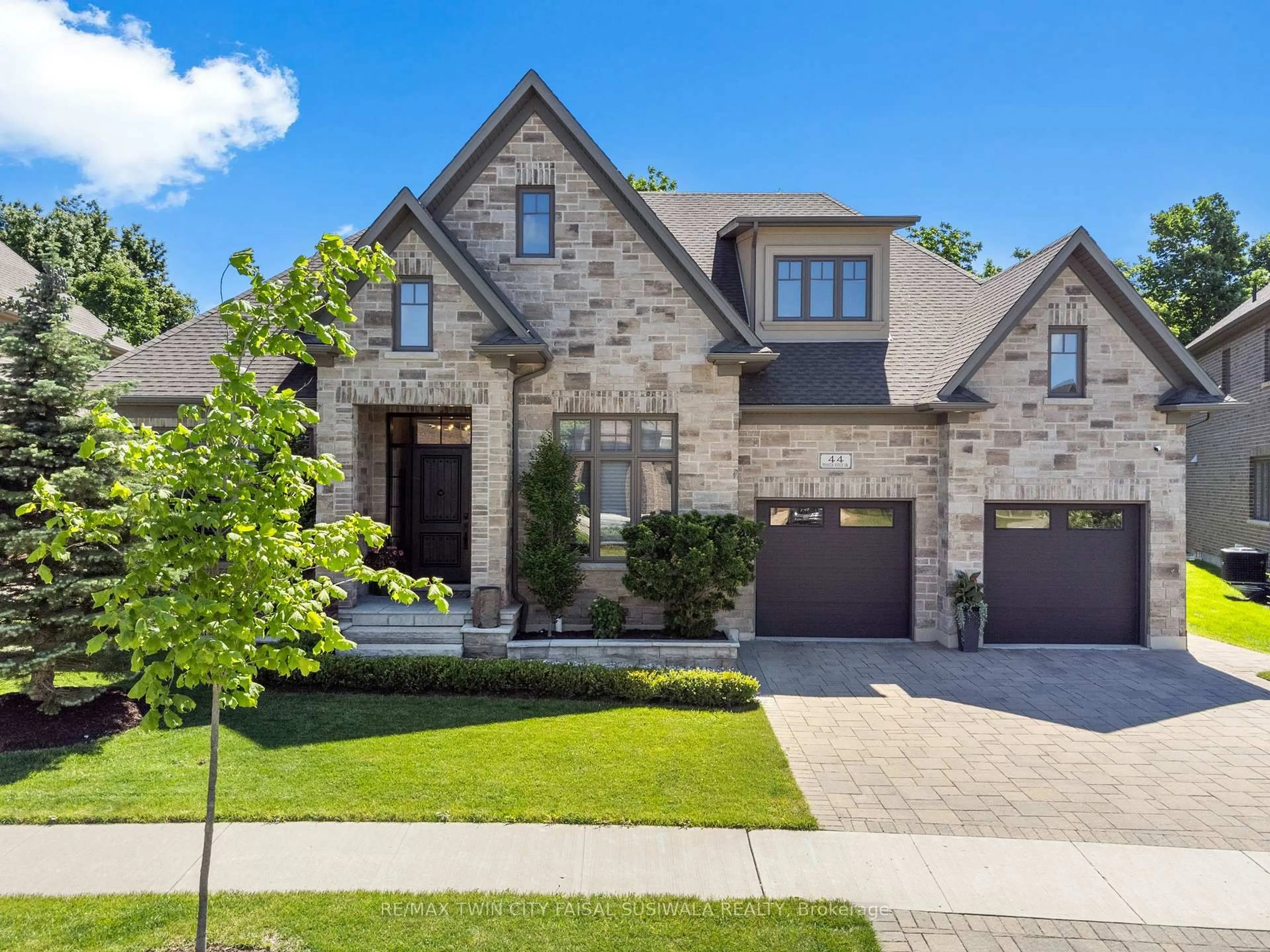 Home with brick exterior material, street for 44 Pioneer Ridge Dr, Kitchener Ontario N2P 0G6