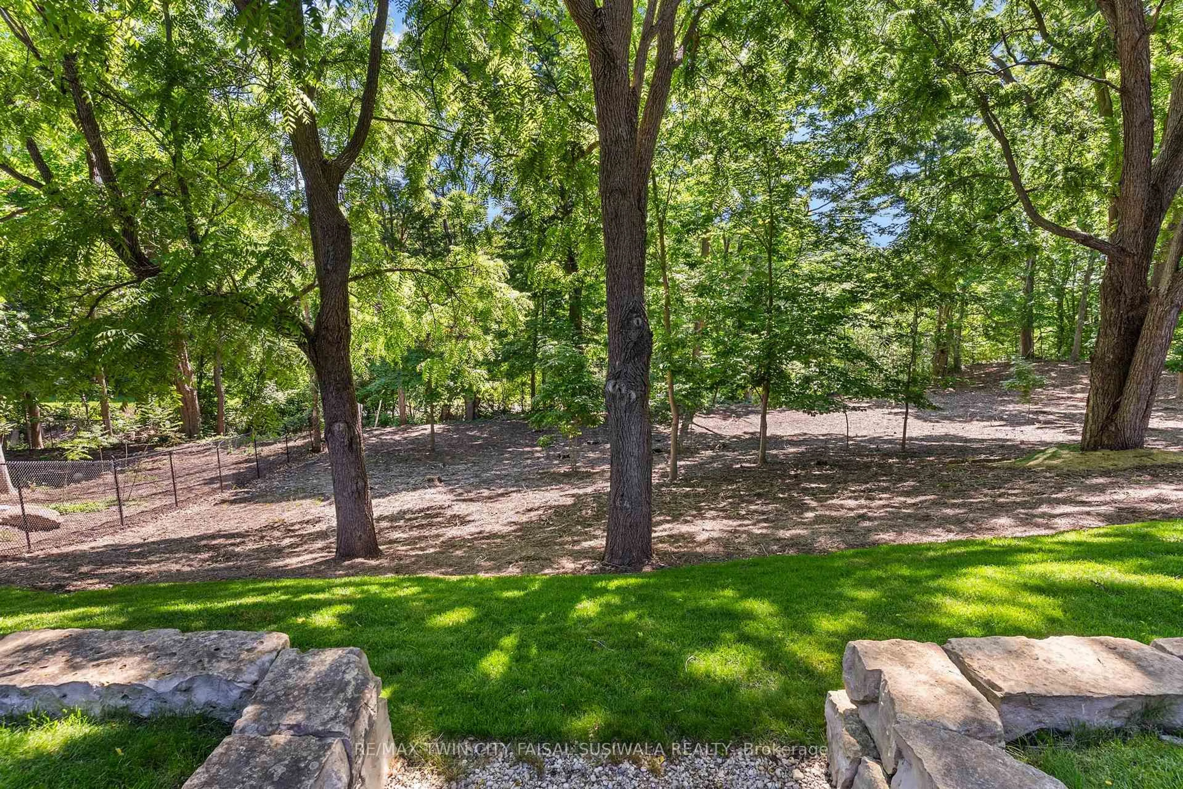 Patio, forest/trees view for 44 Pioneer Ridge Dr, Kitchener Ontario N2P 0G6