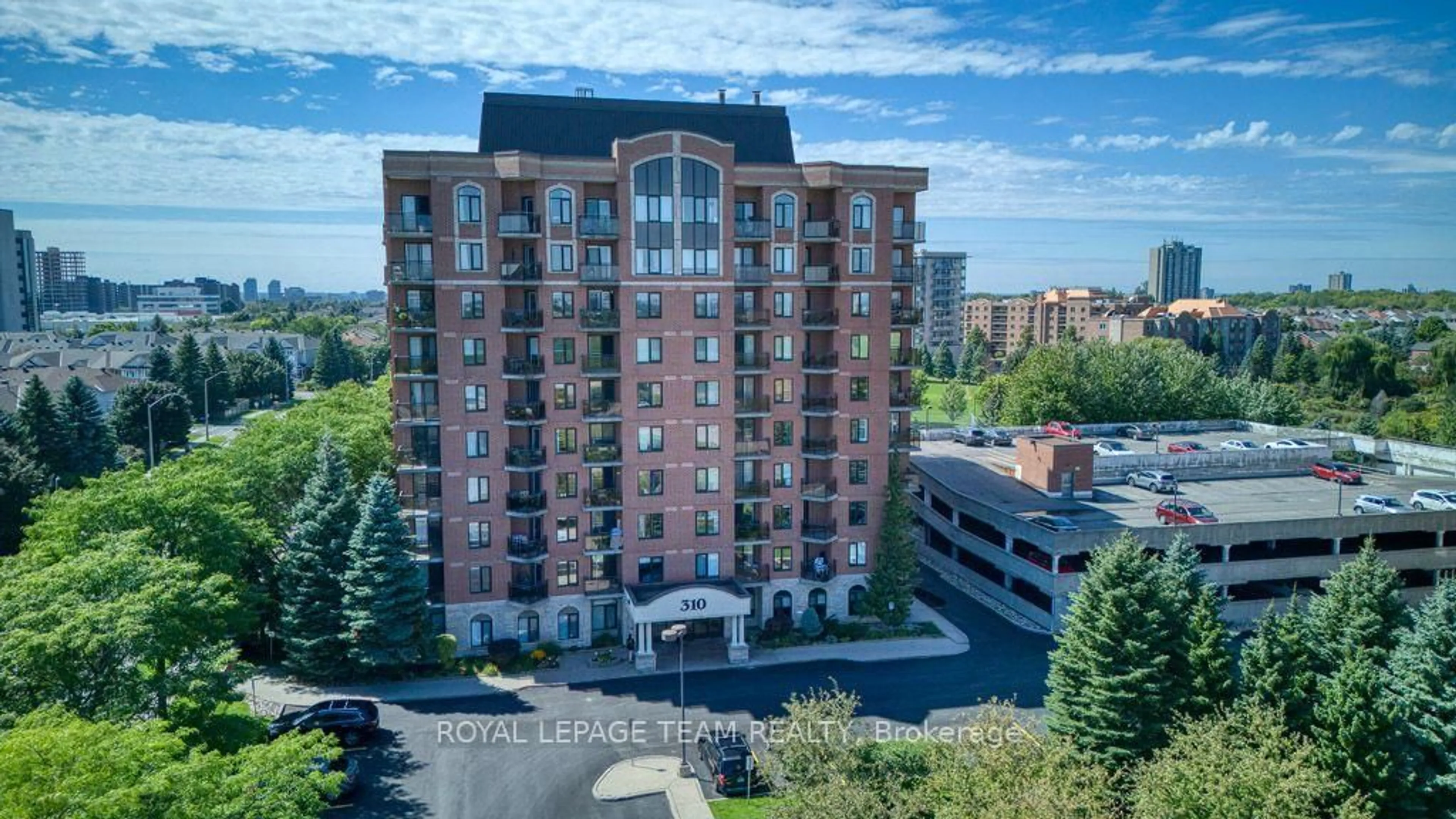 A pic from outside/outdoor area/front of a property/back of a property/a pic from drone, building for 310 Central Park Dr #2H, Ottawa Ontario K2C 4G4