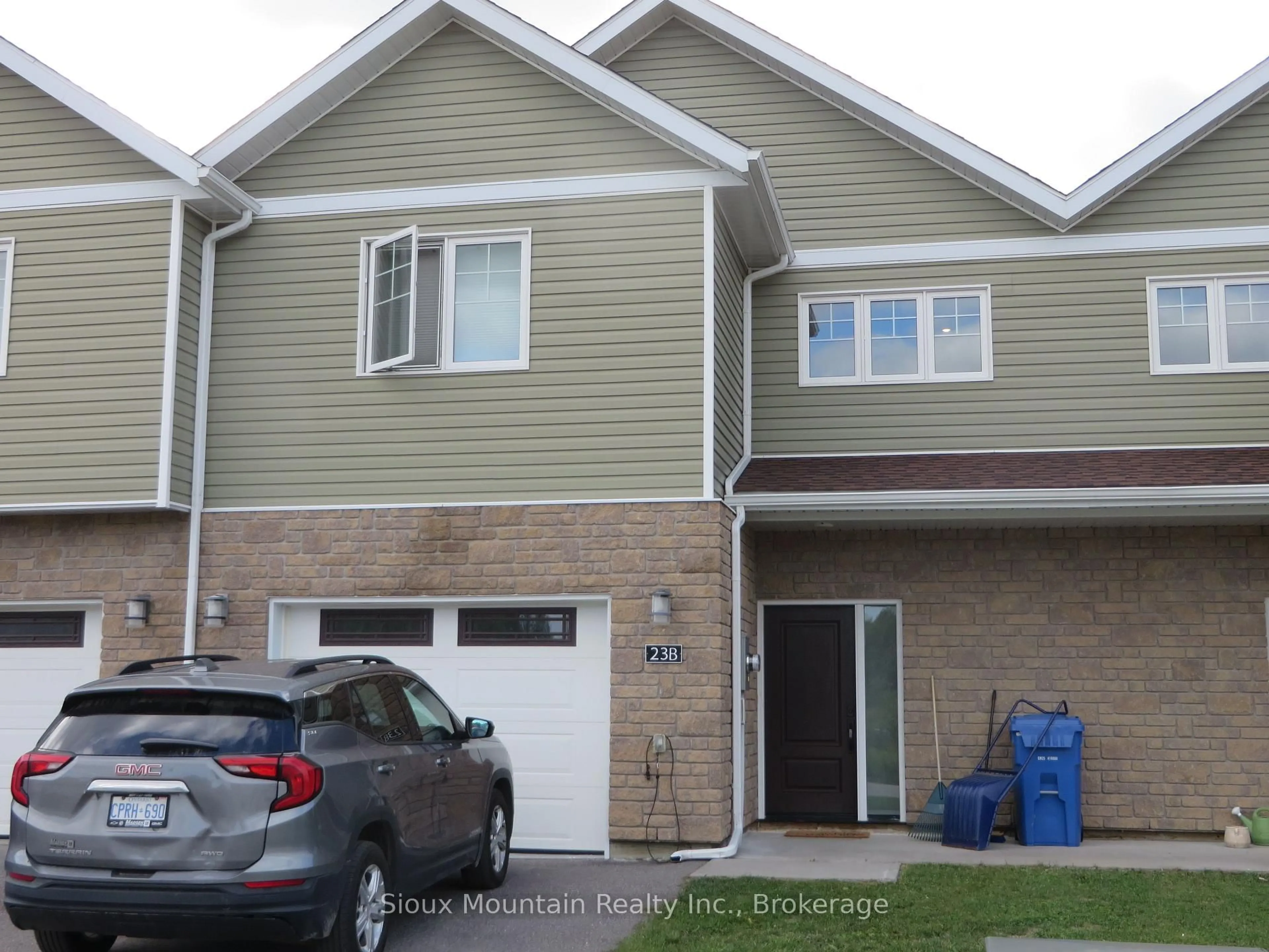 Home with vinyl exterior material, street for 23 Millar Cres #B, Sioux Lookout Ontario P8T 0A9