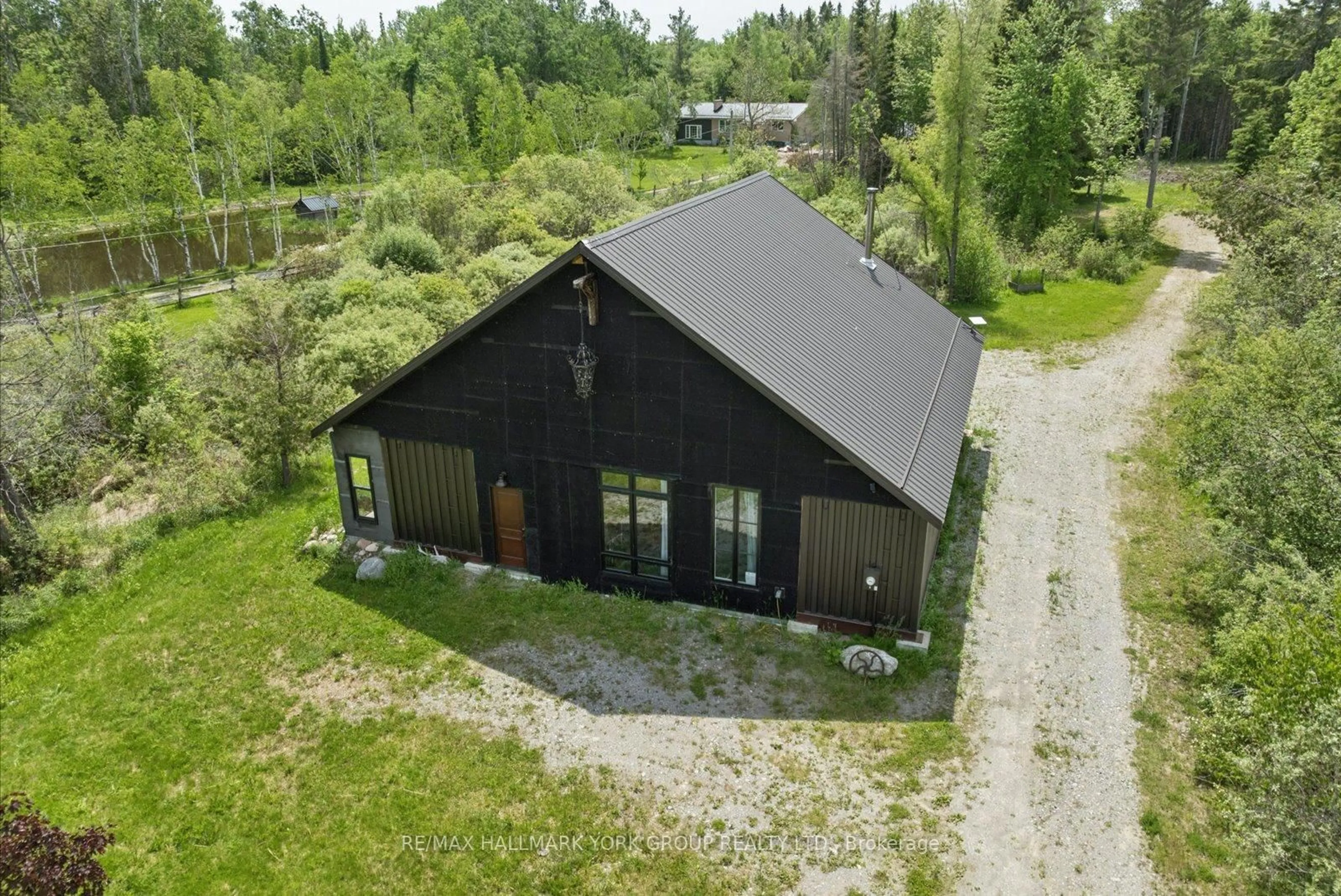 A pic from outside/outdoor area/front of a property/back of a property/a pic from drone, building for 755 Country Lane, Kawartha Lakes Ontario K0M 1N0