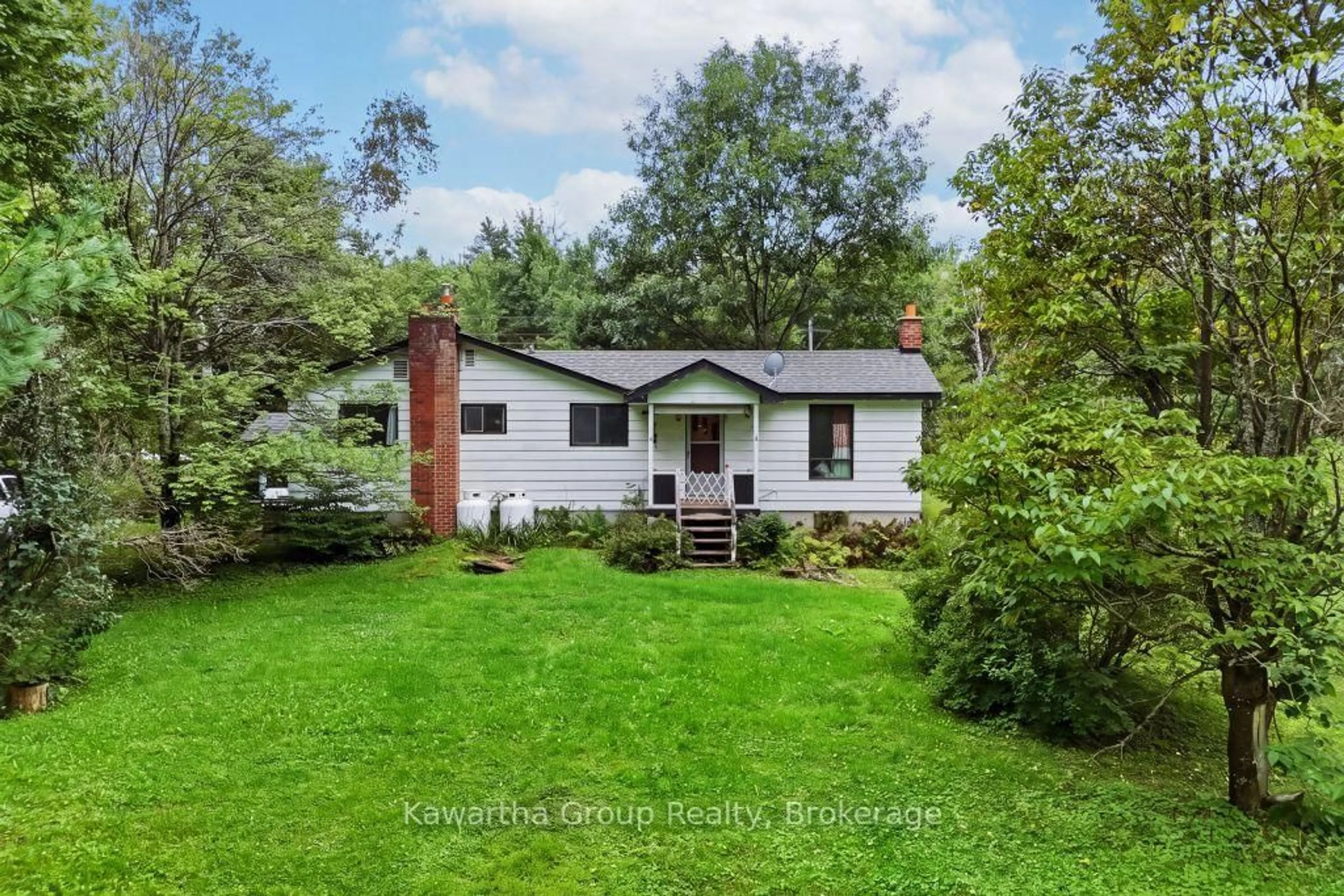 A pic from outside/outdoor area/front of a property/back of a property/a pic from drone, unknown for 15 Cameron Rd, Kawartha Lakes Ontario K0M 2L0