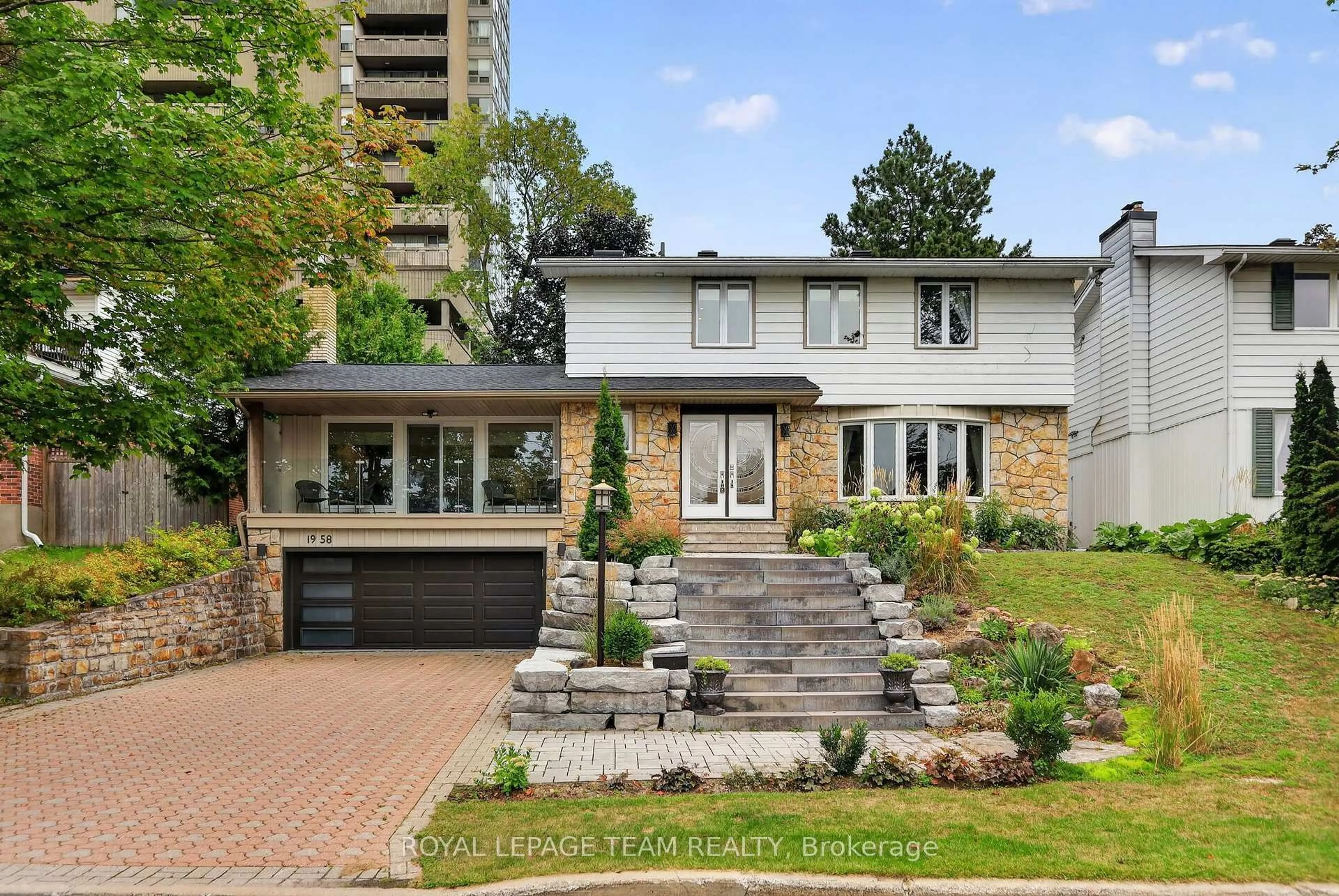 Home with brick exterior material, street for 1958 Neepawa Ave, Ottawa Ontario K2A 3L5