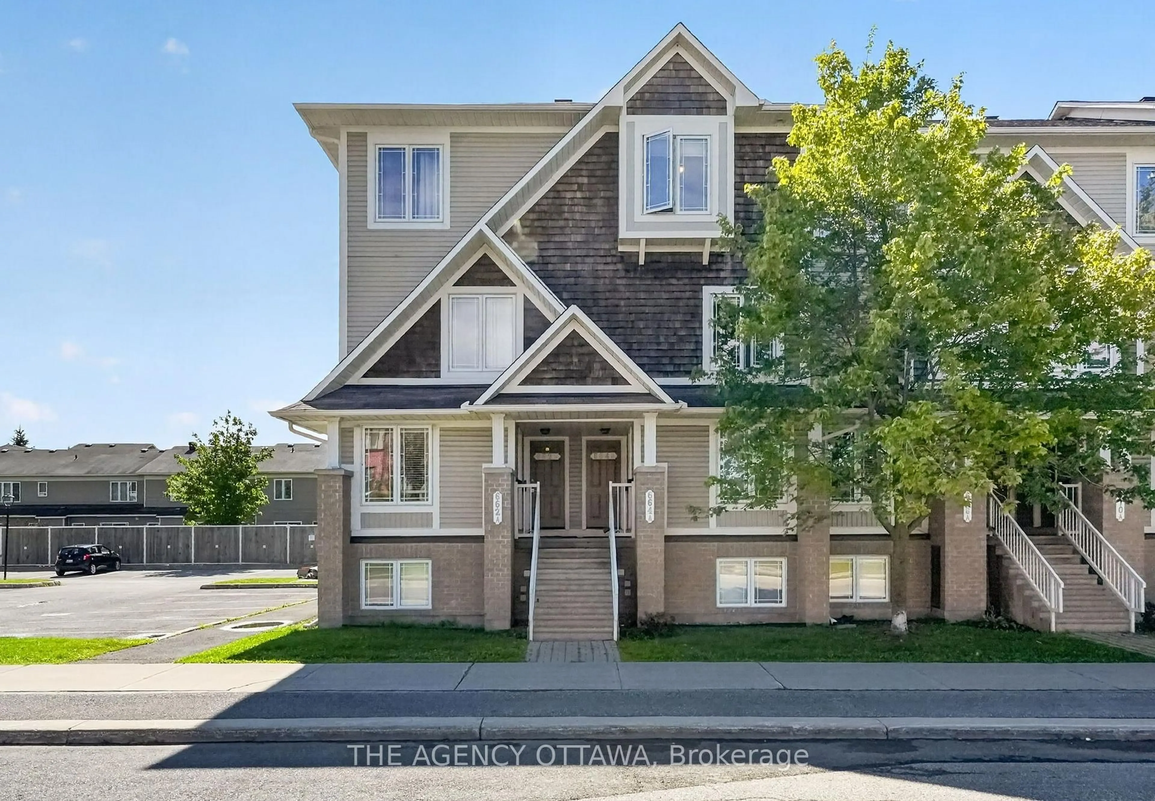 Home with brick exterior material, street for 664 Chapman Mills Dr #B, Ottawa Ontario K2J 3V2